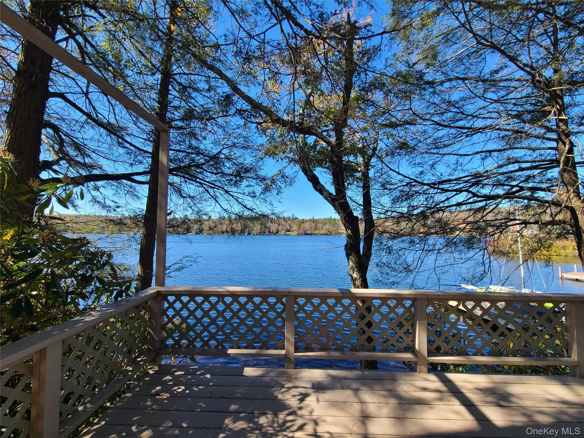 Wooden deck with a water view Wooden deck with a water view