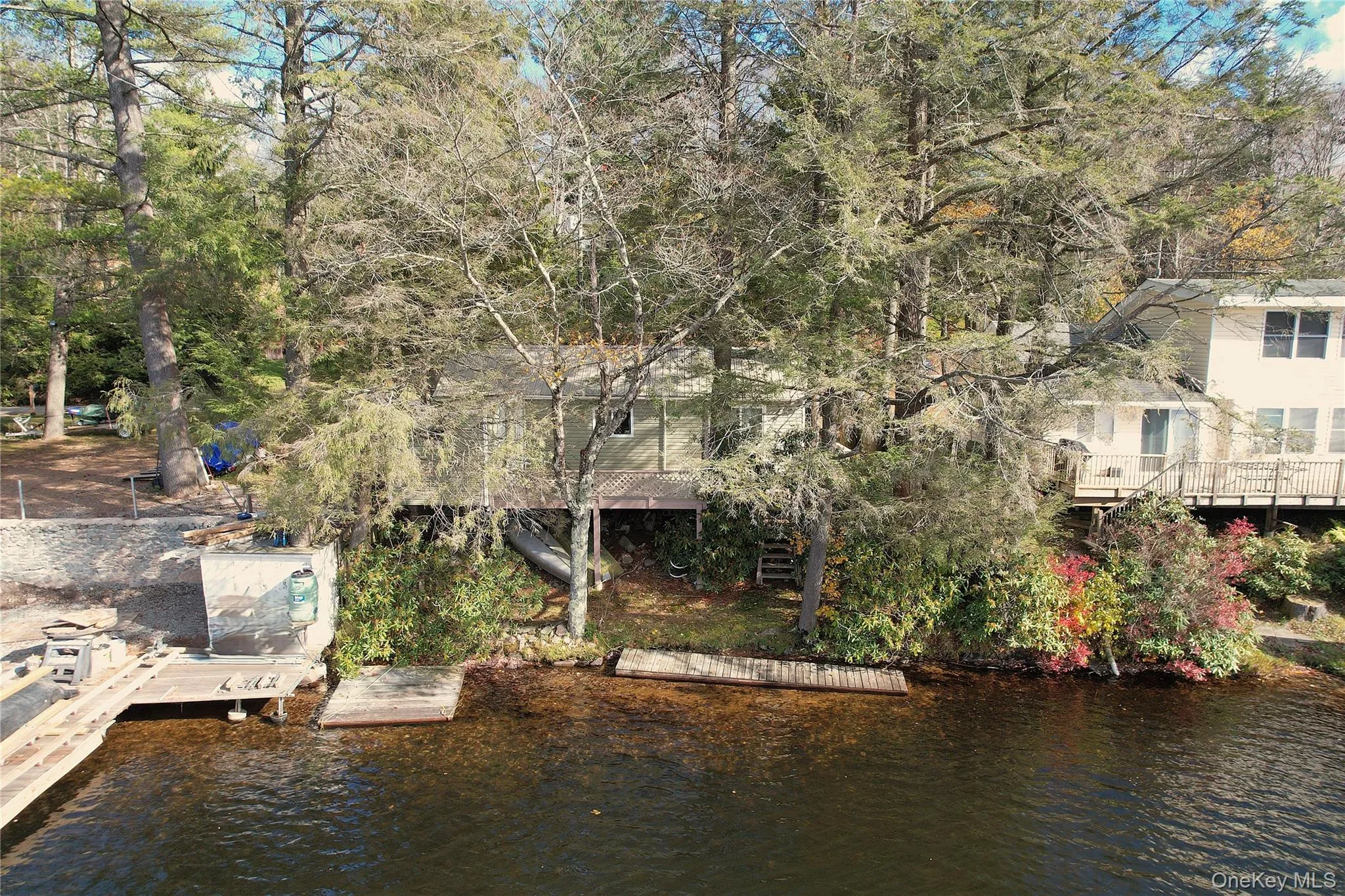 Dock with a water view and stairs Dock with a water view and stairs