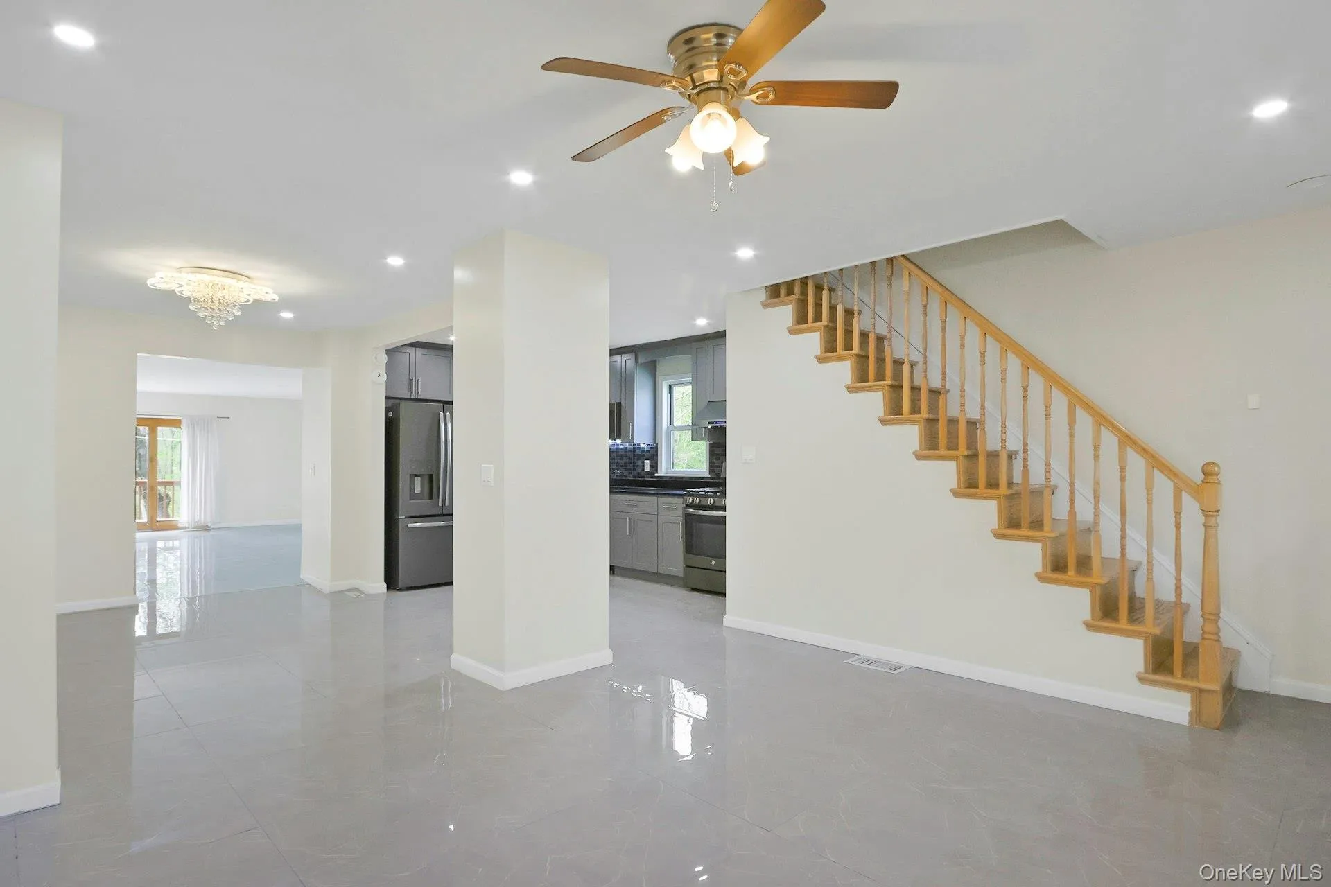 Living room looking toward dining room and kitchen Living room looking toward dining room and kitchen