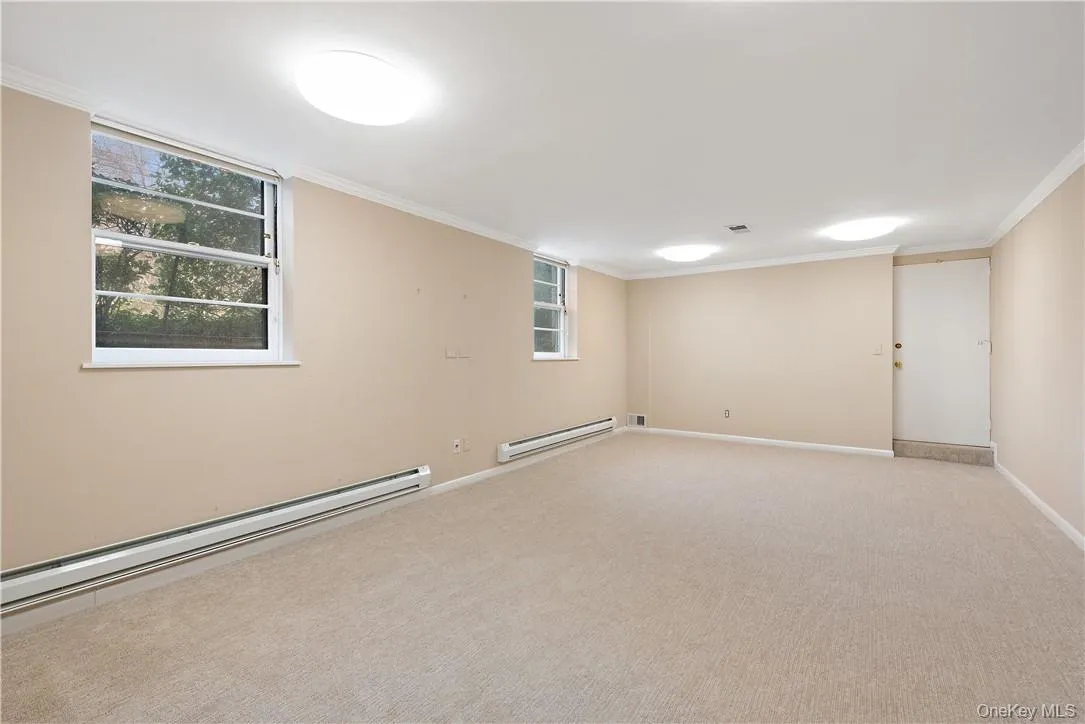 Lower level recreation room and walk out to Lower level recreation room and walk out to