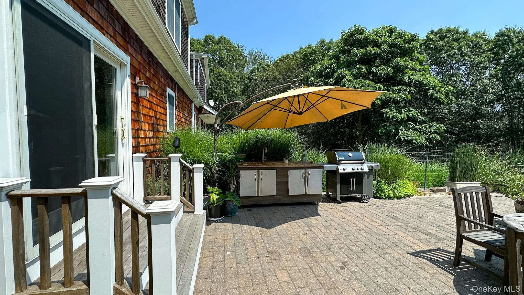 View of patio featuring grilling area View of patio featuring grilling area