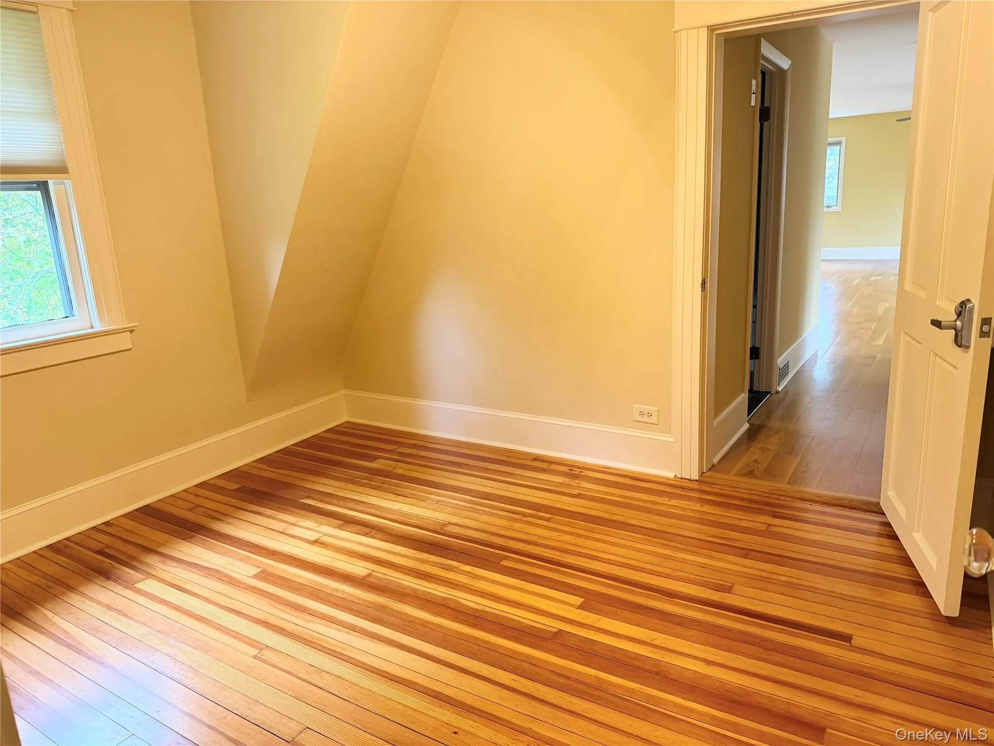 Sitting room before entering primary suite or office space. Sitting room before entering primary suite or office space.