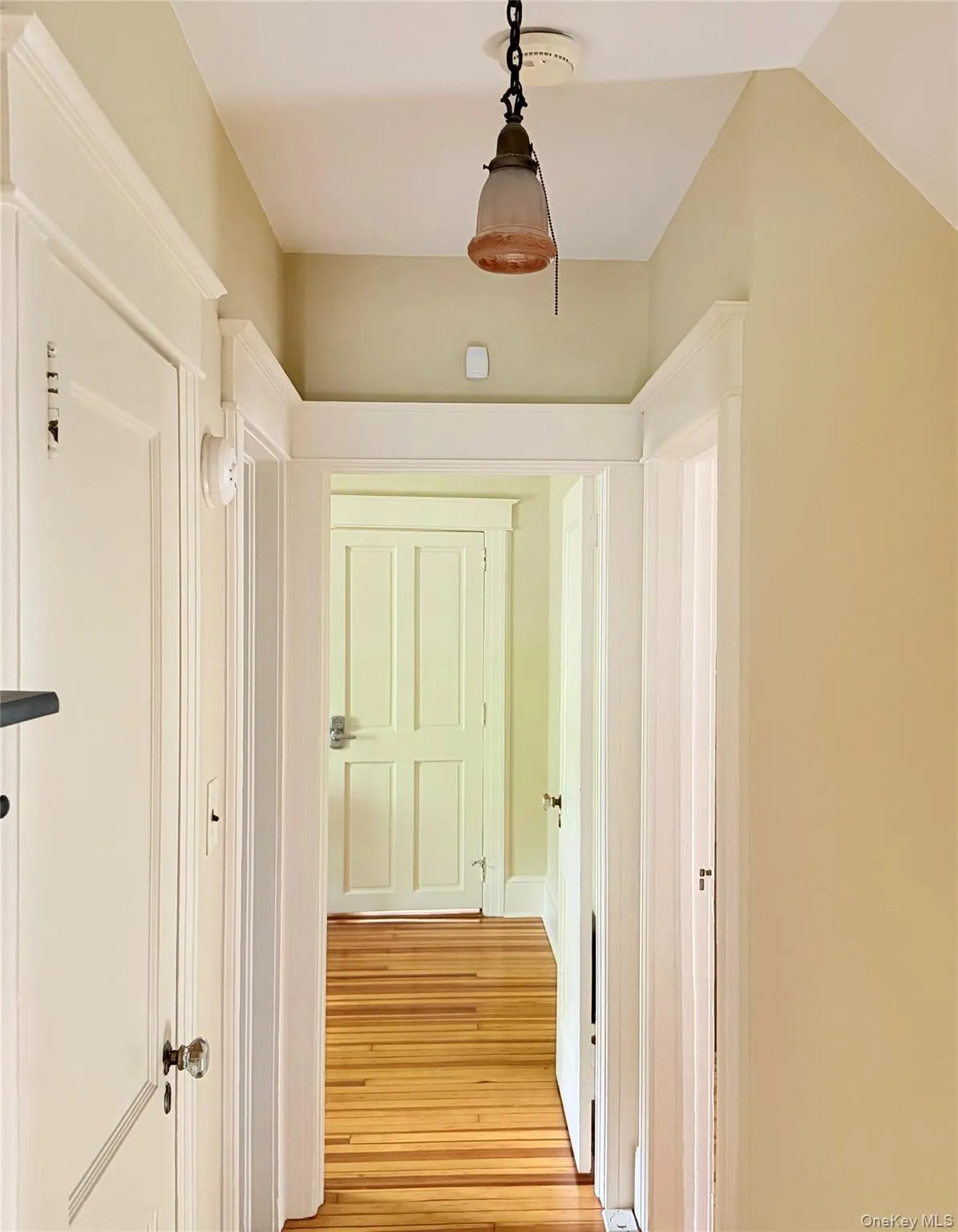 Hallway on second floor leading to primary bedroom Hallway on second floor leading to primary bedroom