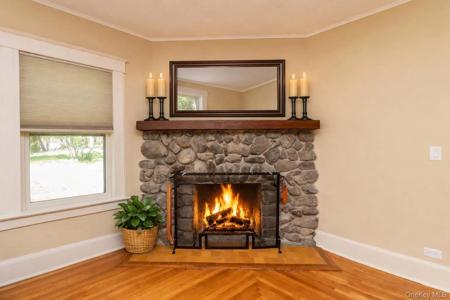 Beautiful stone fireplace in living room Beautiful stone fireplace in living room