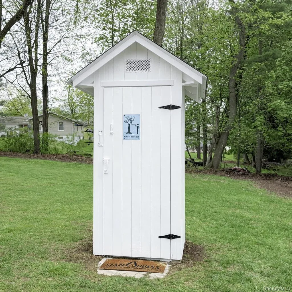 Original outhouse on side of barn Original outhouse on side of barn