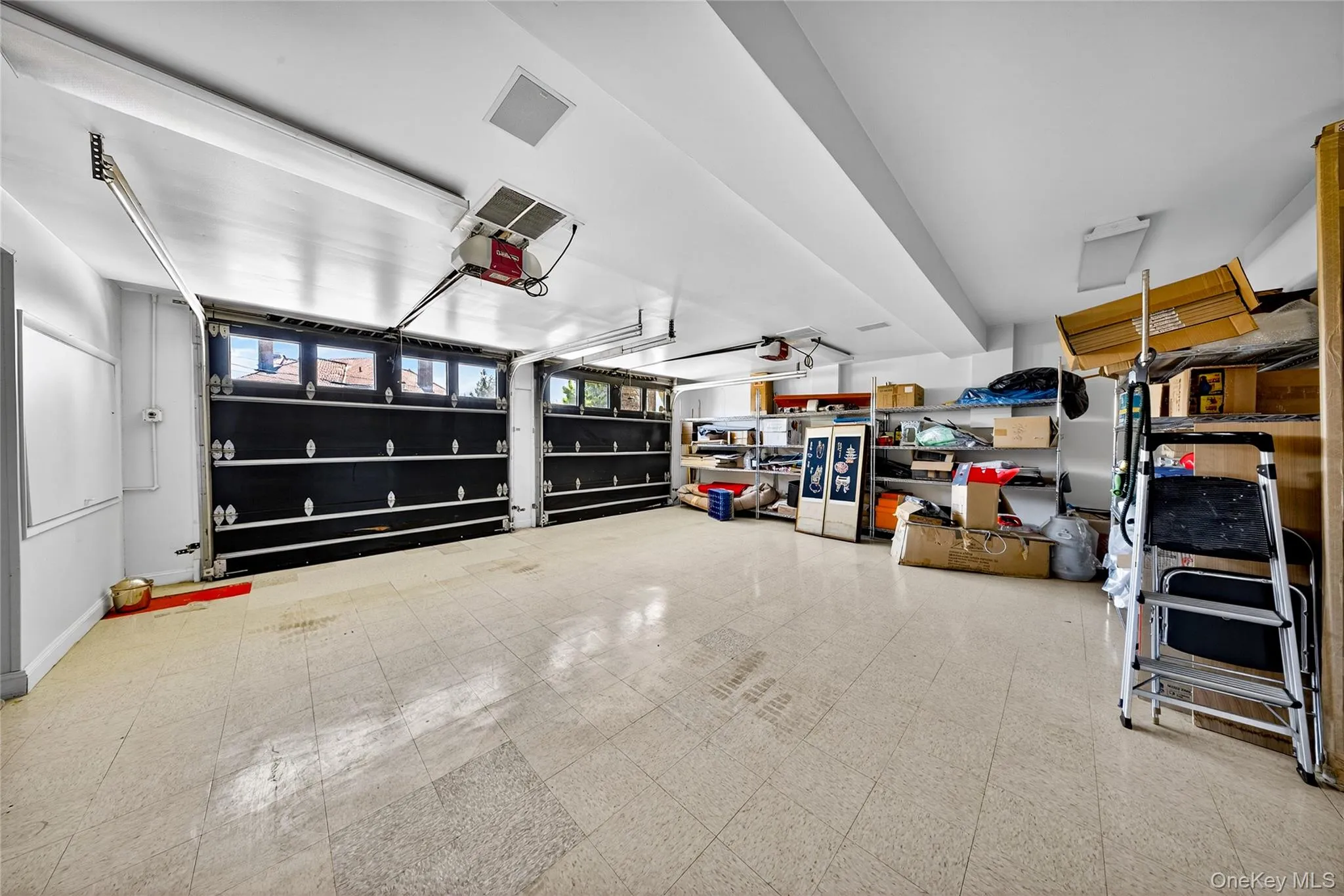 Garage with a garage door opener Garage with a garage door opener