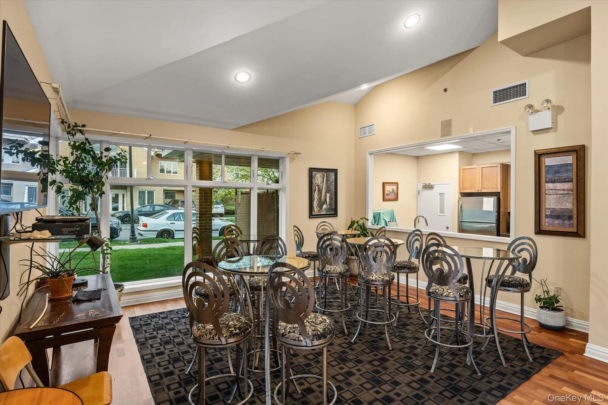 Spacious communal area featuring a tall vaulted ceiling and recessed lighting Spacious communal area featuring a tall vaulted ceiling and recessed lighting