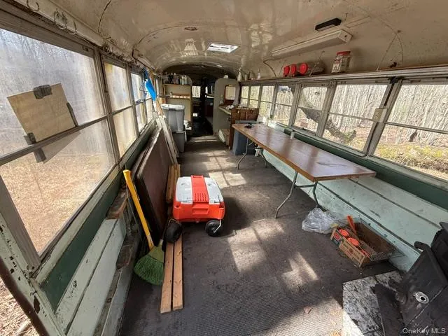 Inside of the Yellow bus utilized for outdoor/ camping activities Inside of the Yellow bus utilized for outdoor/ camping activities