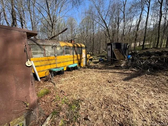 Yellow School bus utilized for camping/outdoor activities Yellow School bus utilized for camping/outdoor activities