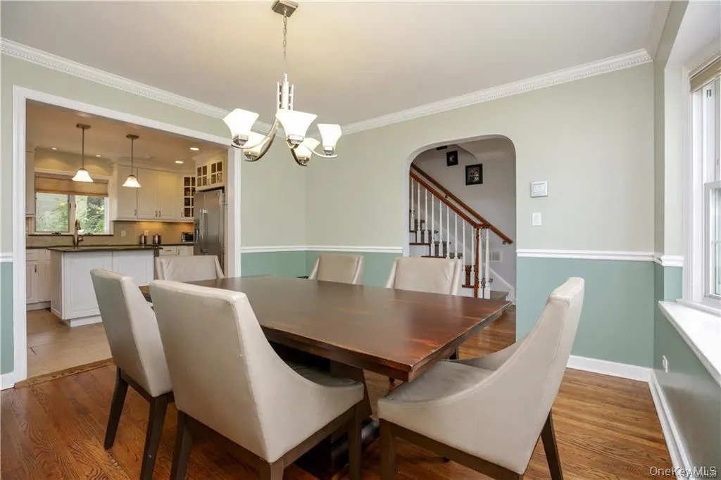Formal dining room with open floor plan allows for easy entertaining.Very light and bright, the perfect space to host a party! Formal dining room with open floor plan allows for easy entertaining.Very light and bright, the perfect space to host a party!