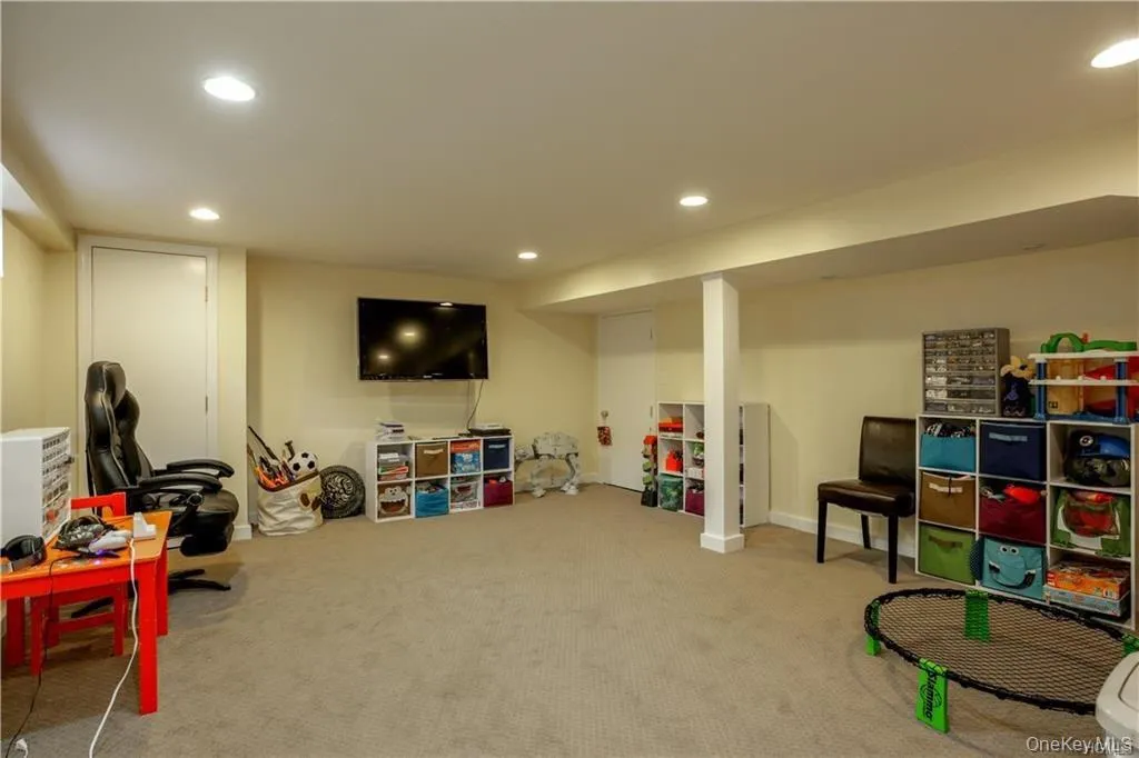 Lower level recreation room, could be used as a home gym or office. Lower level recreation room, could be used as a home gym or office.