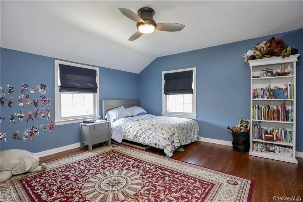 Bedroom with two large windows, beautiful hardwood floors and two large closets. Bedroom with two large windows, beautiful hardwood floors and two large closets.