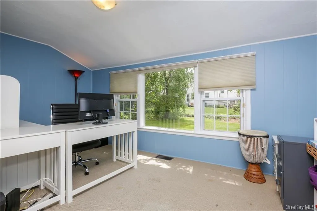 Office/study/playroom on 1st floor sits off of the living room. Office/study/playroom on 1st floor sits off of the living room.