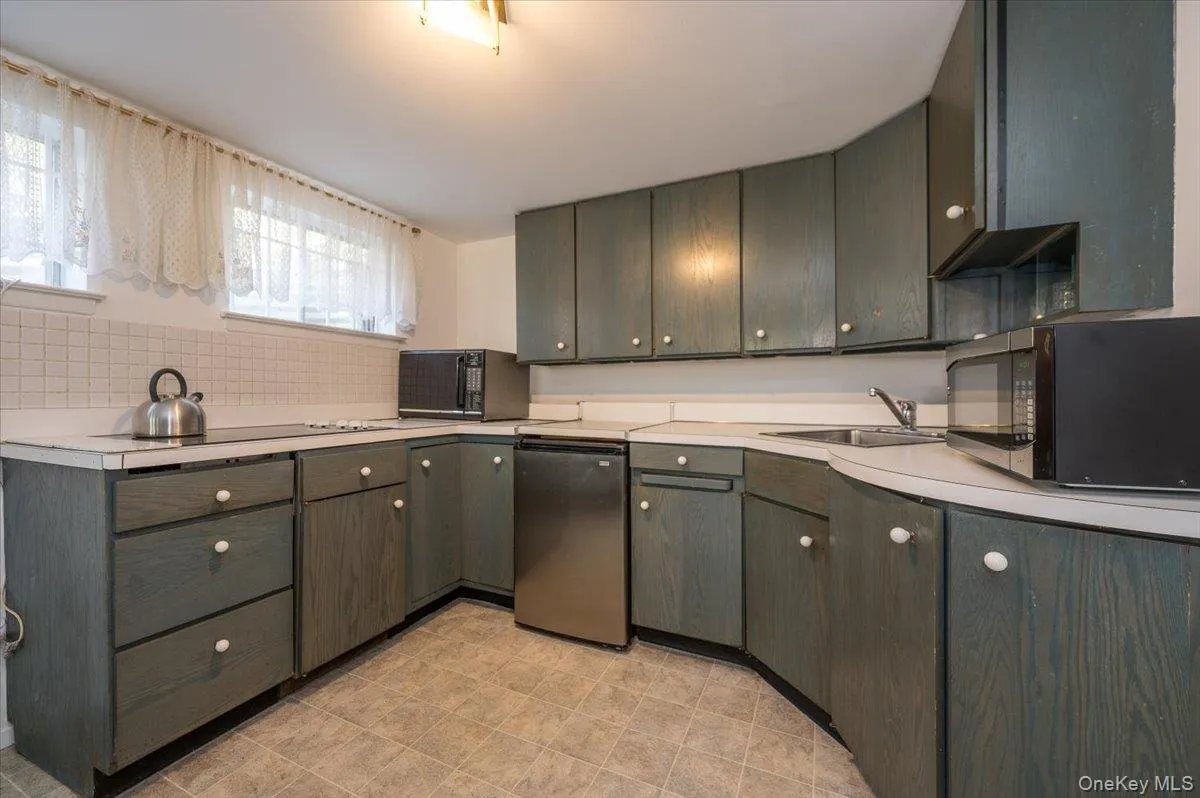 Electric Range, Refrigerator, Microwave and Cabinets Electric Range, Refrigerator, Microwave and Cabinets