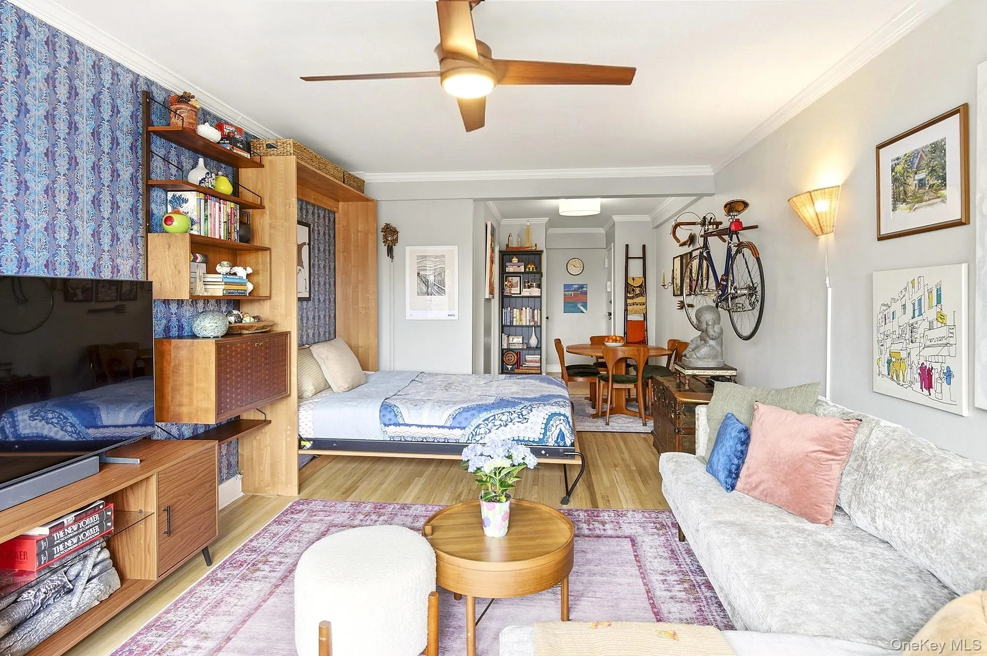 Living room features a Murphy Bed that can be included with the sale Living room features a Murphy Bed that can be included with the sale