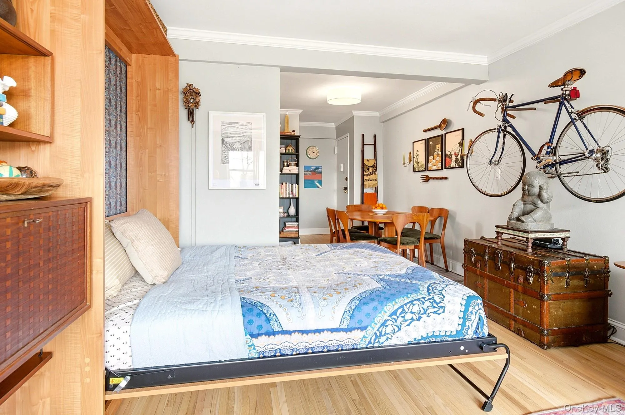 Living room features a Murphy Bed that can be included with the sale Living room features a Murphy Bed that can be included with the sale