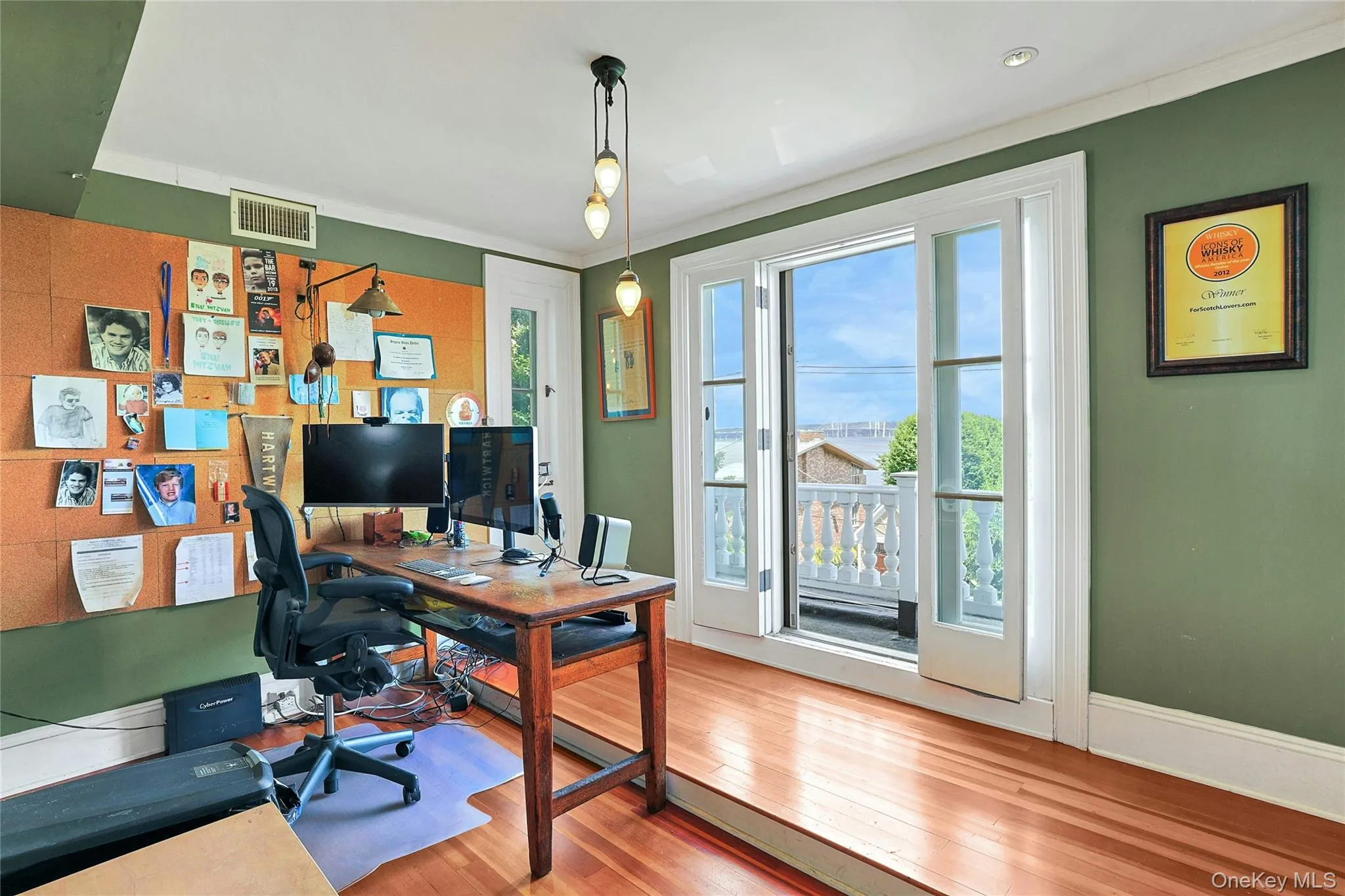 2nd floor office with Juliet balcony and open river and bridge views 2nd floor office with Juliet balcony and open river and bridge views