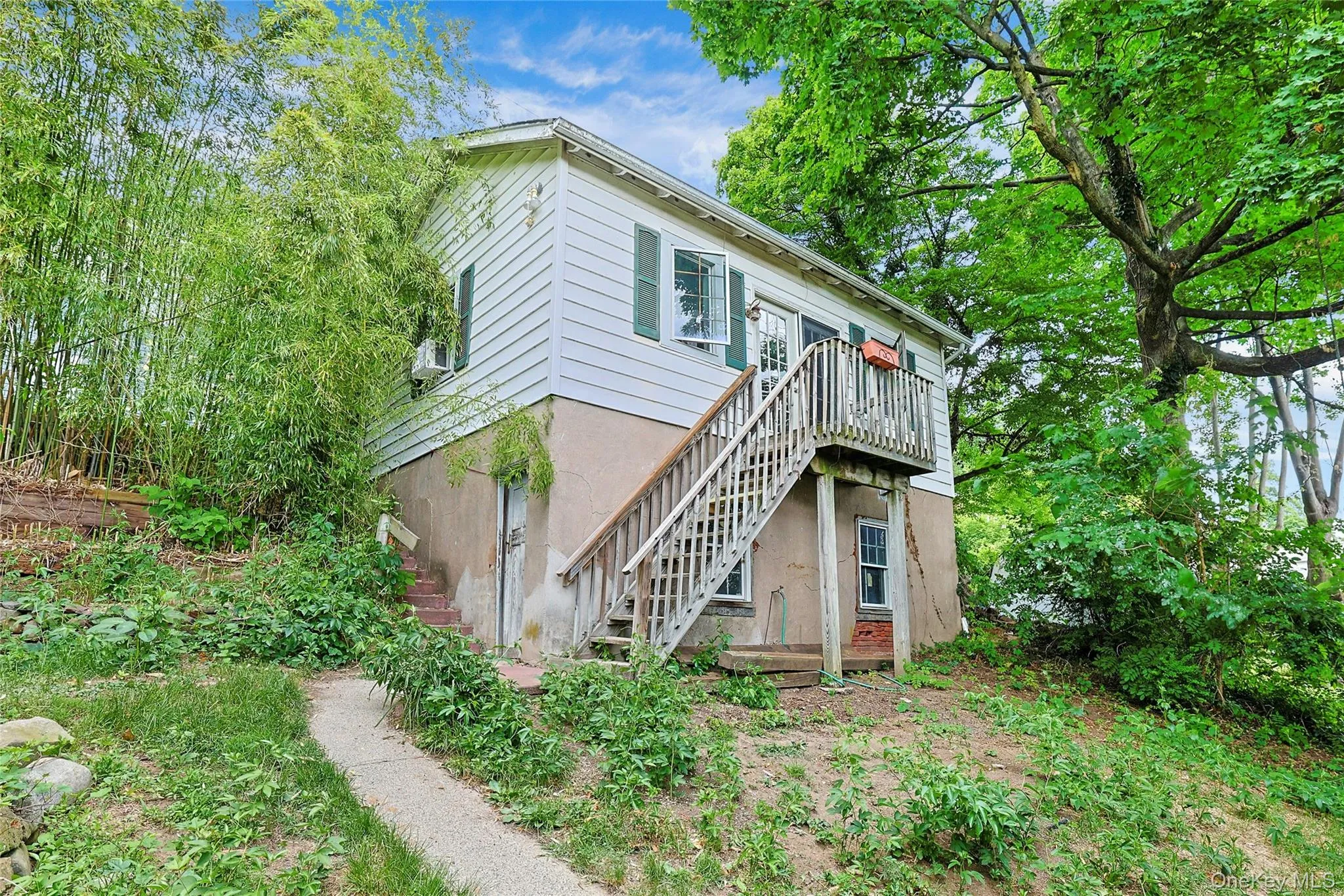 separate structure with cathedral ceilings, studio with bath upstairs, large storage downstairs. separate structure with cathedral ceilings, studio with bath upstairs, large storage downstairs.
