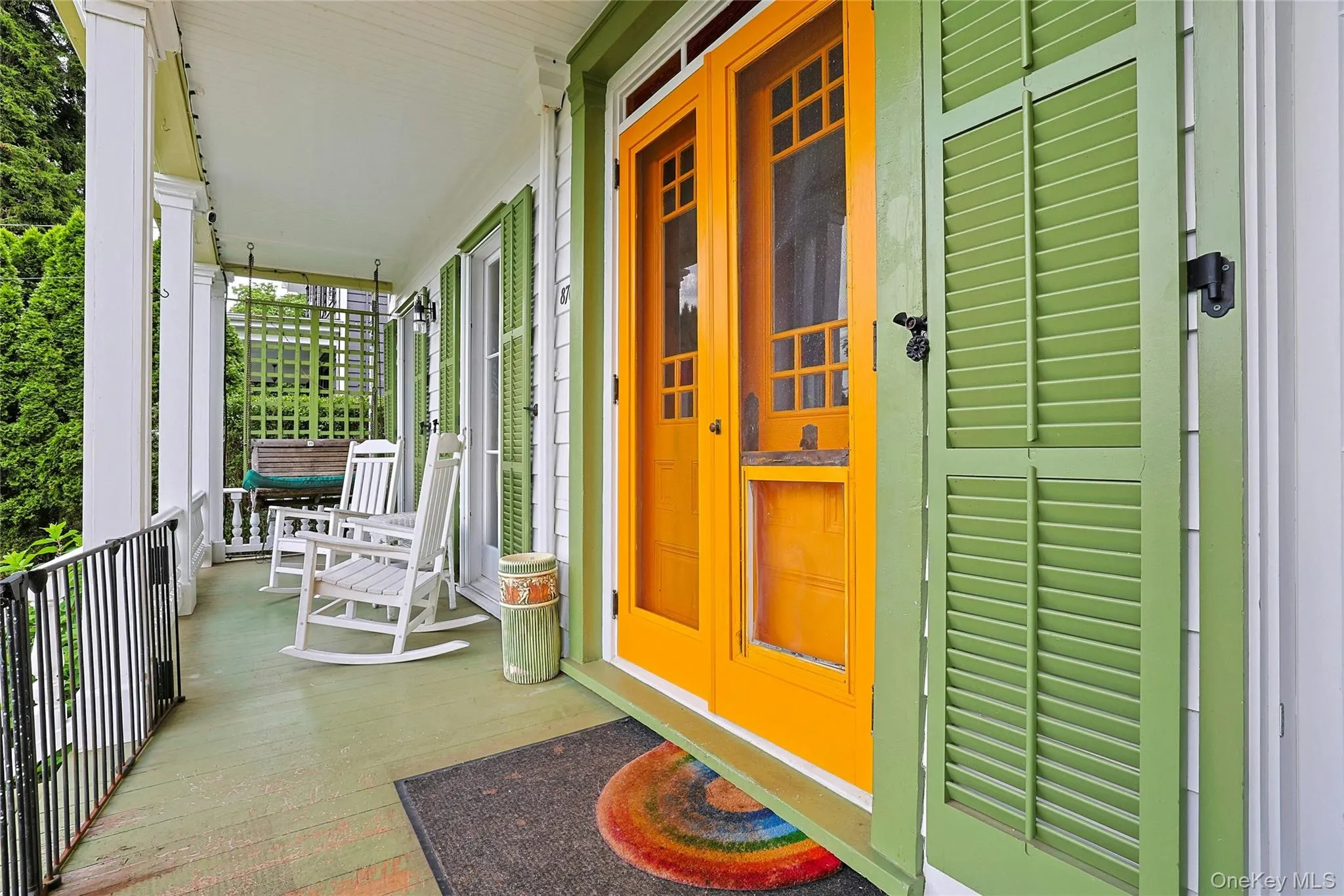 entry door and left side porch entry door and left side porch