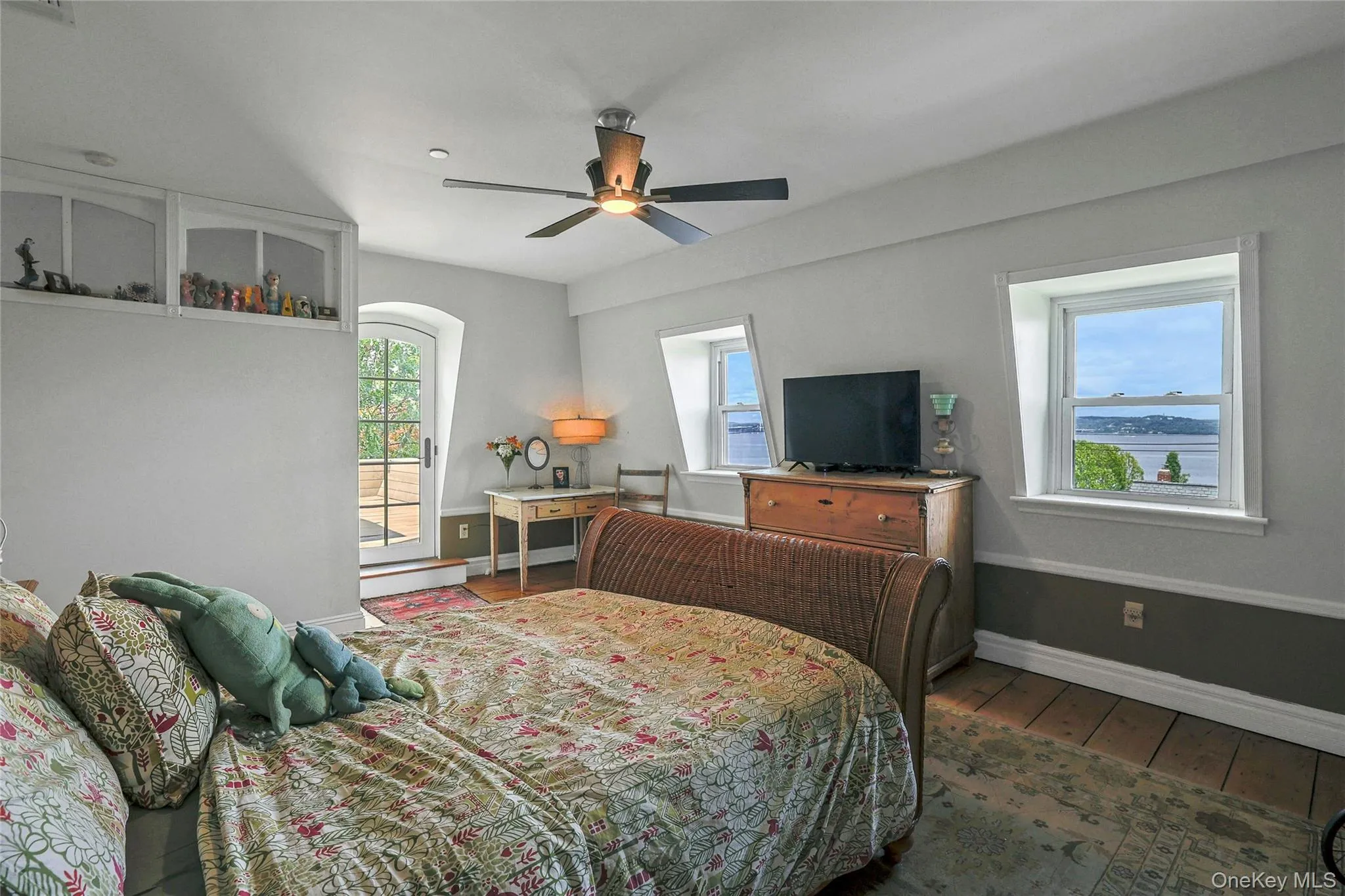 huge primary bedroom with open river and bridge views and access to the deck huge primary bedroom with open river and bridge views and access to the deck