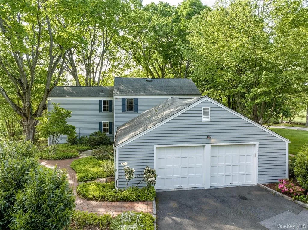Generous two car garage with an area for bikes, with a storage area above. Generous two car garage with an area for bikes, with a storage area above.