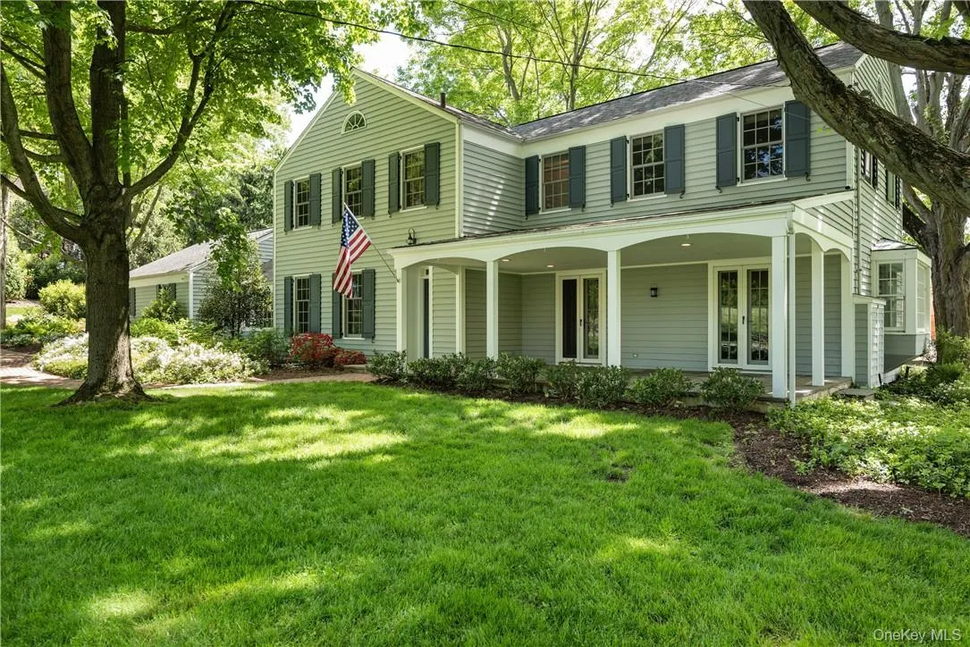 Beautiful covered porch to relax or entertain on a hot afternoon. Beautiful covered porch to relax or entertain on a hot afternoon.