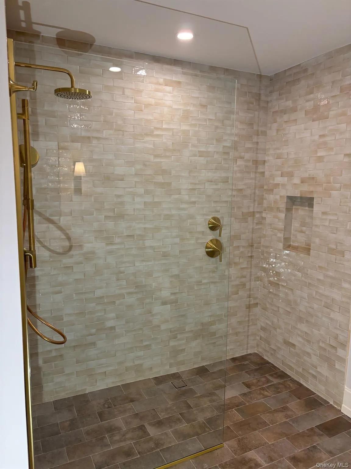 Stunning walk-in shower. Stunning walk-in shower.