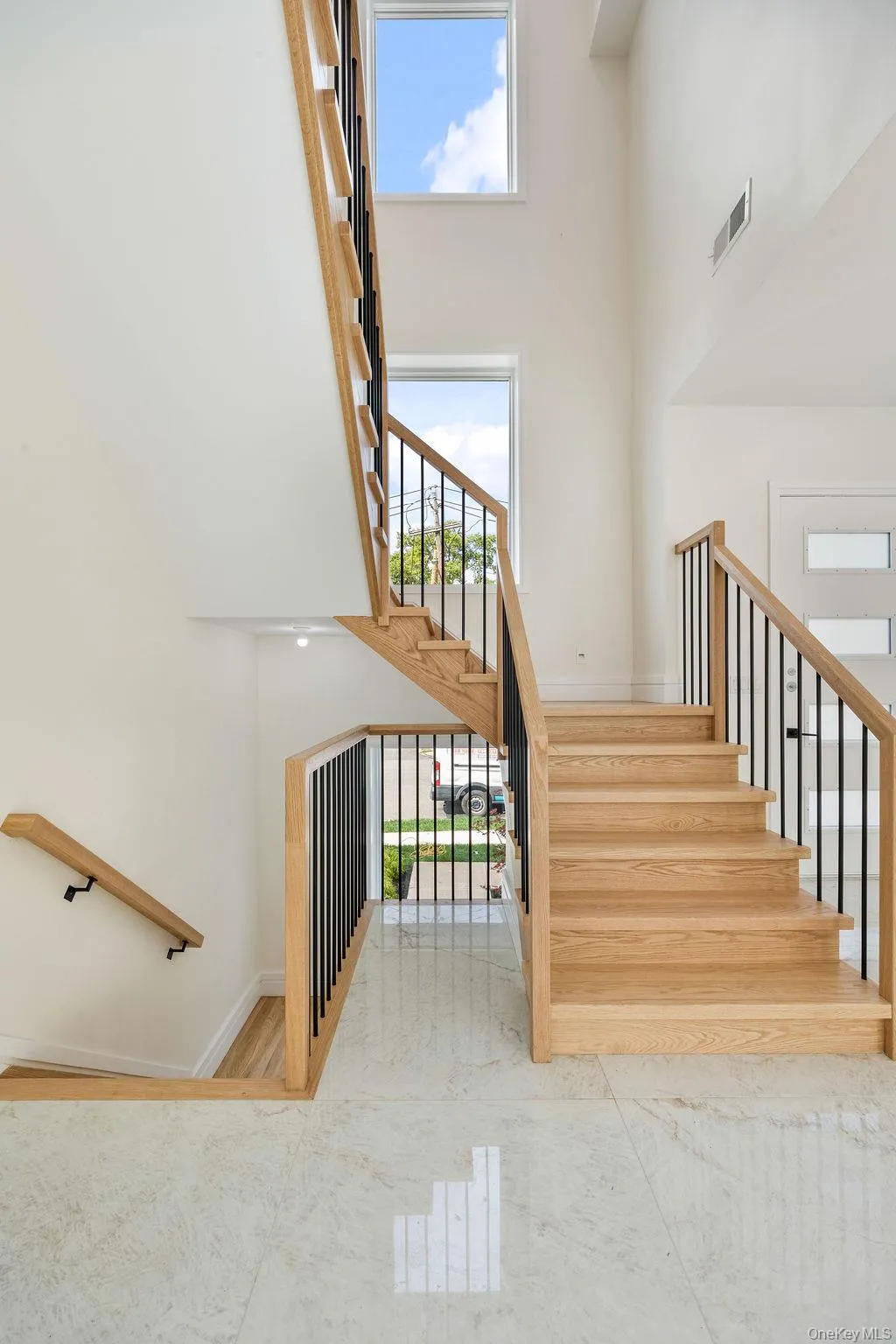 Entryway with 3 story foyer Entryway with 3 story foyer