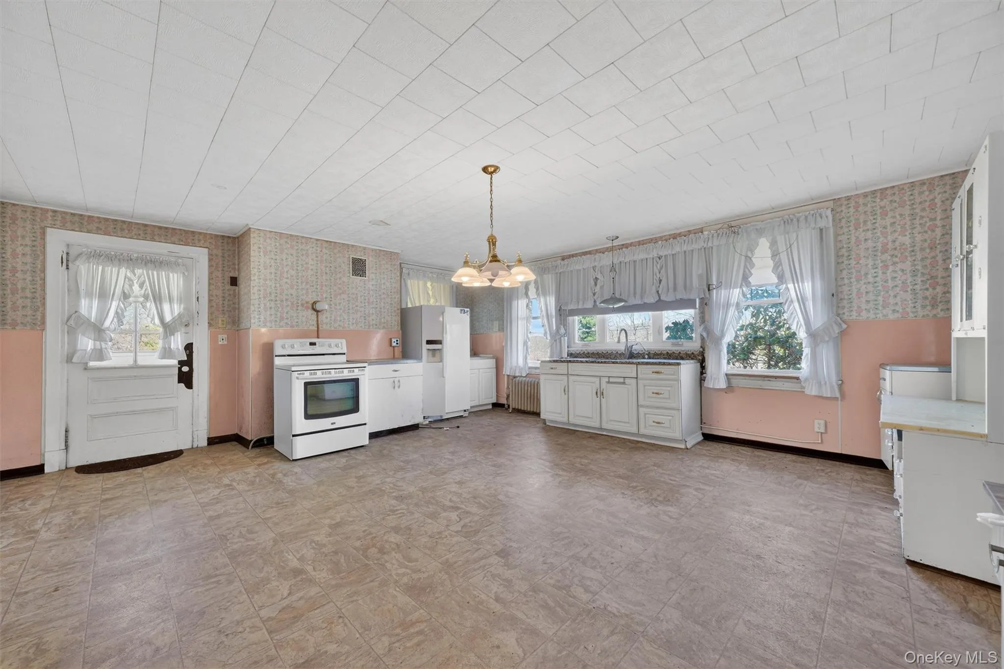 Large functional kitchen with access to yard Large functional kitchen with access to yard