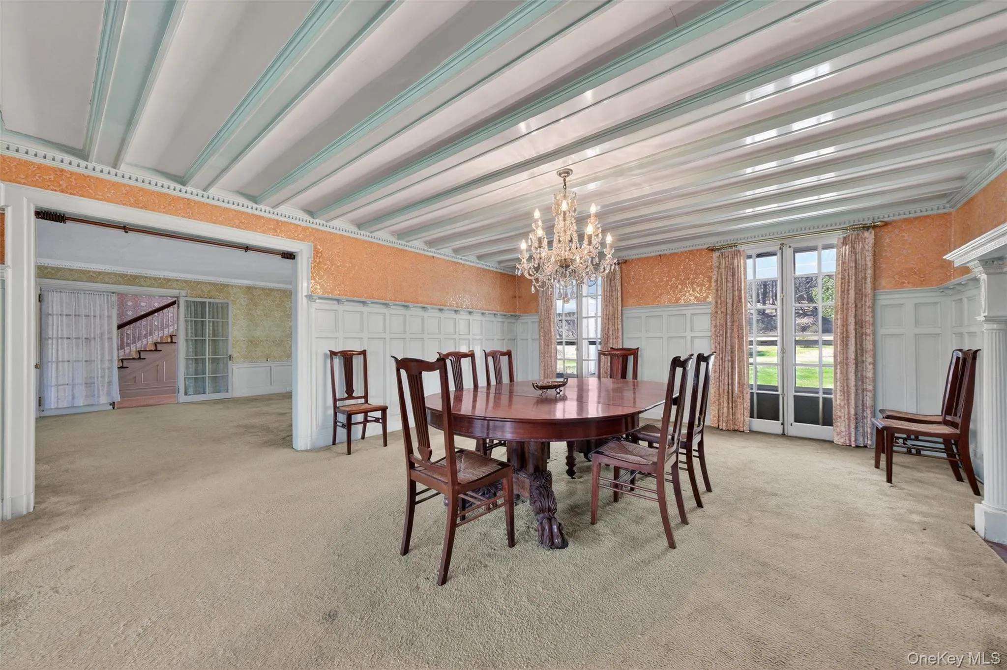 Formal dining room with French windows and access to porch Formal dining room with French windows and access to porch