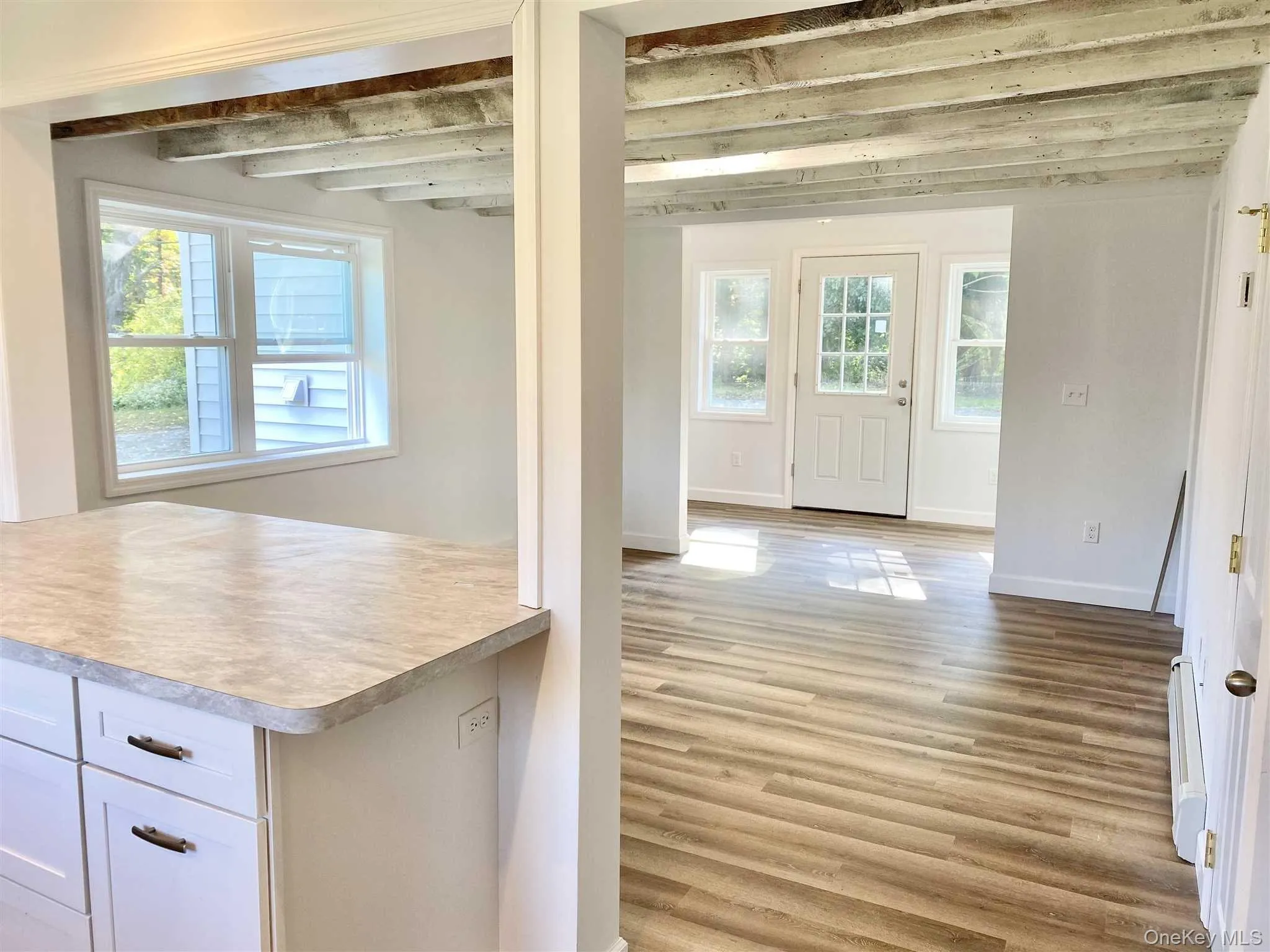 View of living area, kitchen and entry View of living area, kitchen and entry