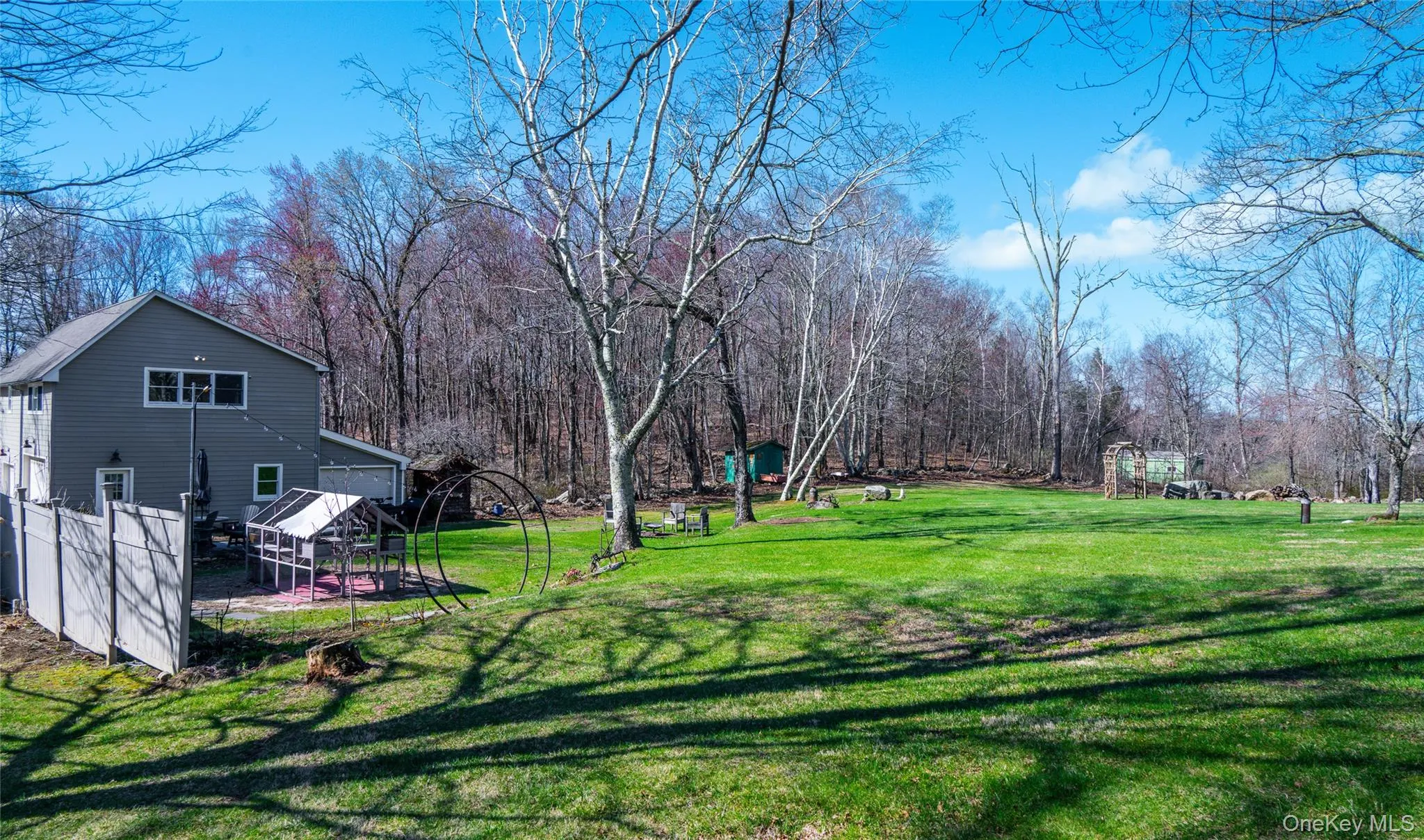Level with a firepit and dining area Level with a firepit and dining area