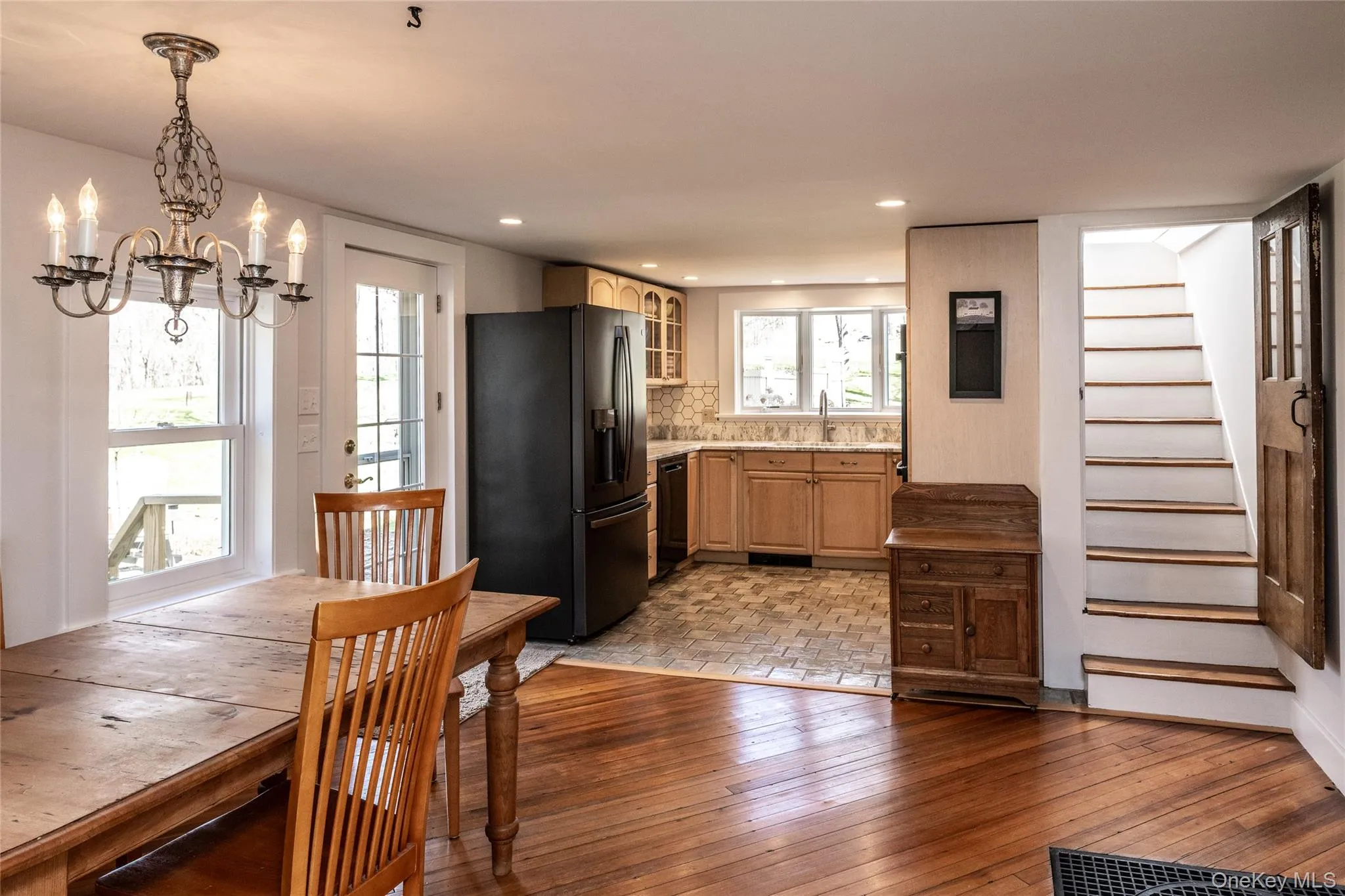 Dining area looking into kitchen Dining area looking into kitchen