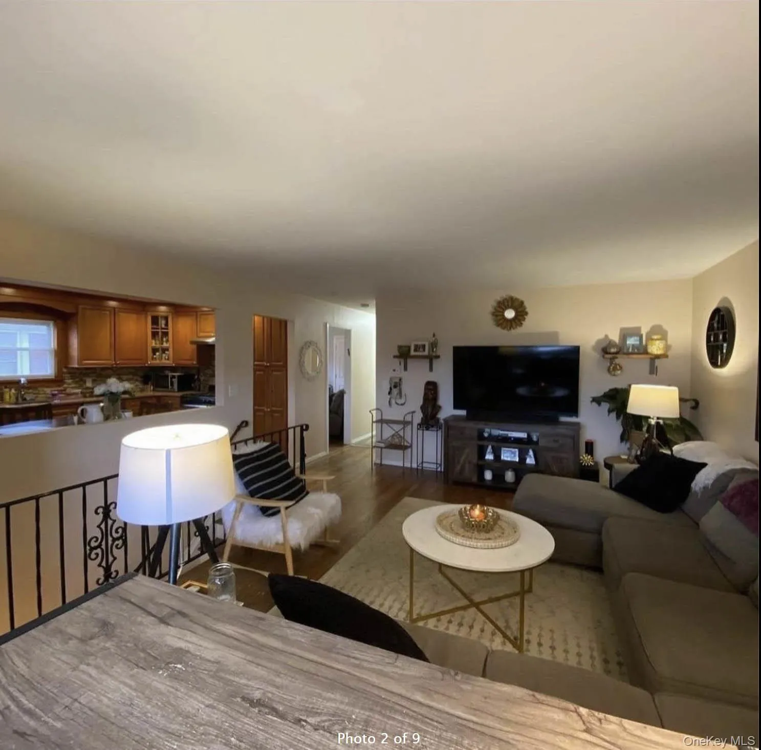 Living room featuring wood finished floors and baseboards Living room featuring wood finished floors and baseboards