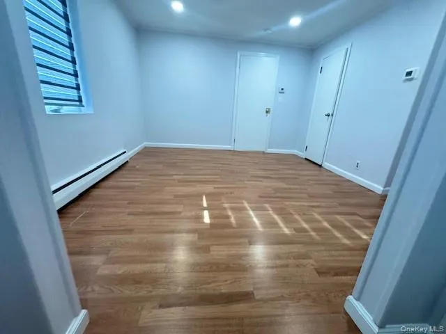 Bedroom View Facing Door To Living Room (and Closet Door) from Second Entry area Bedroom View Facing Door To Living Room (and Closet Door) from Second Entry area