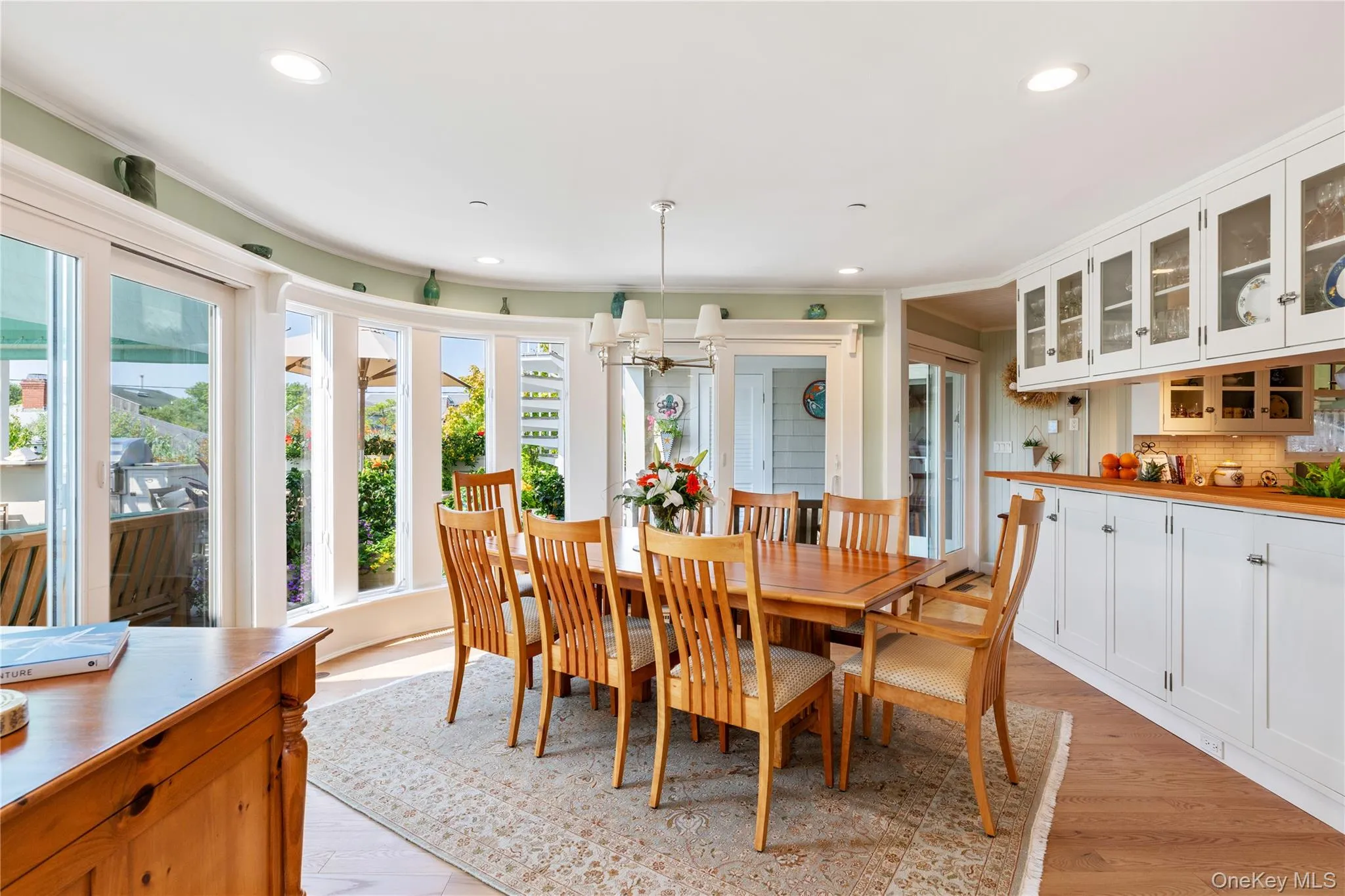 Dining room featuring chandelier and 8 person table ( with leaf fits 12) Dining room featuring chandelier and 8 person table ( with leaf fits 12)