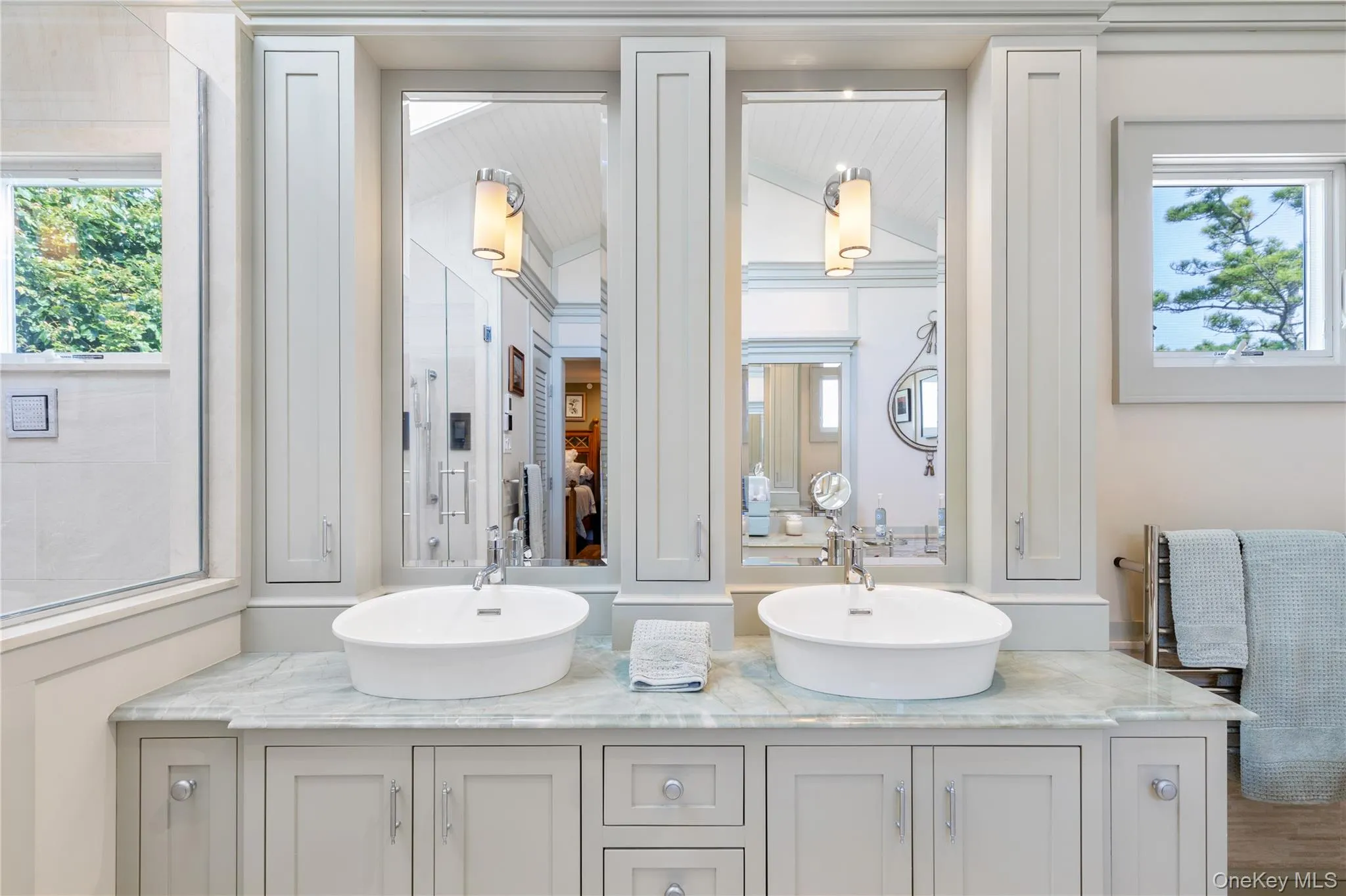 Full bathroom featuring double vanity and a sink Full bathroom featuring double vanity and a sink