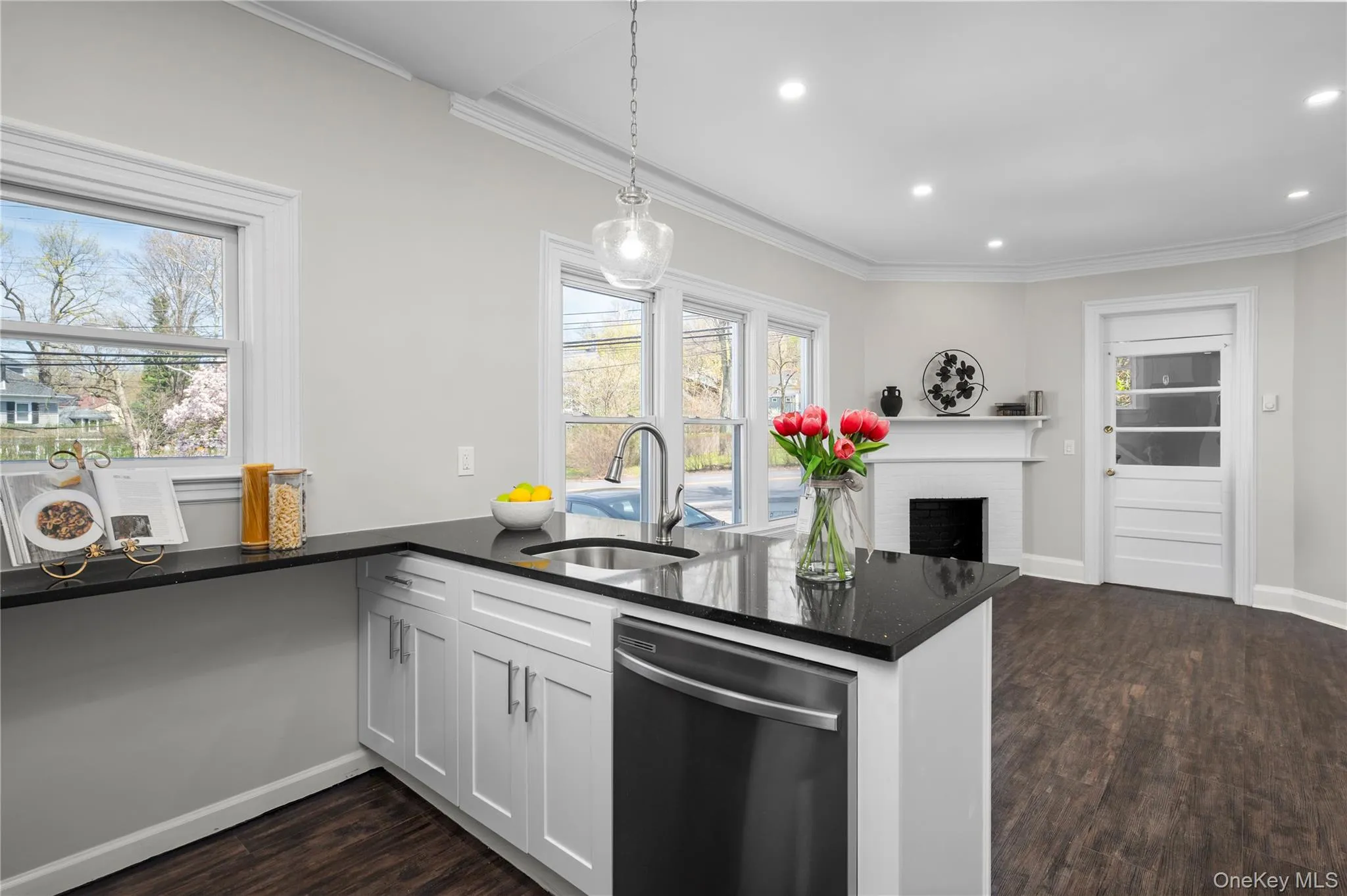 Open concept kitchen that flows to living room and dining room area Open concept kitchen that flows to living room and dining room area