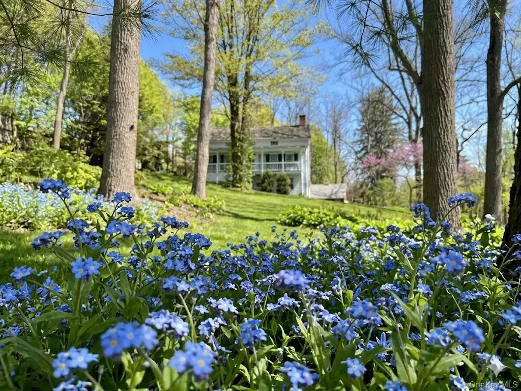 A botanical sanctuary in every sense: Spring blooms lead the way to the historic main residence A botanical sanctuary in every sense: Spring blooms lead the way to the historic main residence