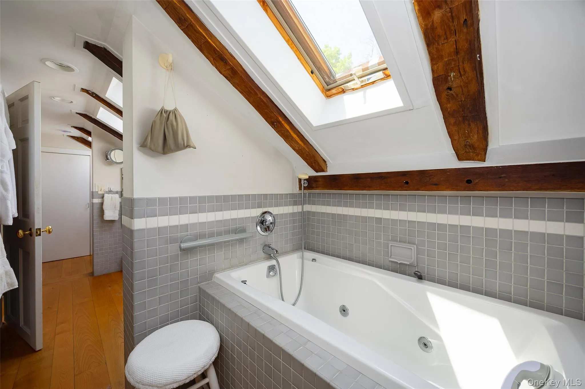 Bathroom featuring a jacuzzi tub Bathroom featuring a jacuzzi tub