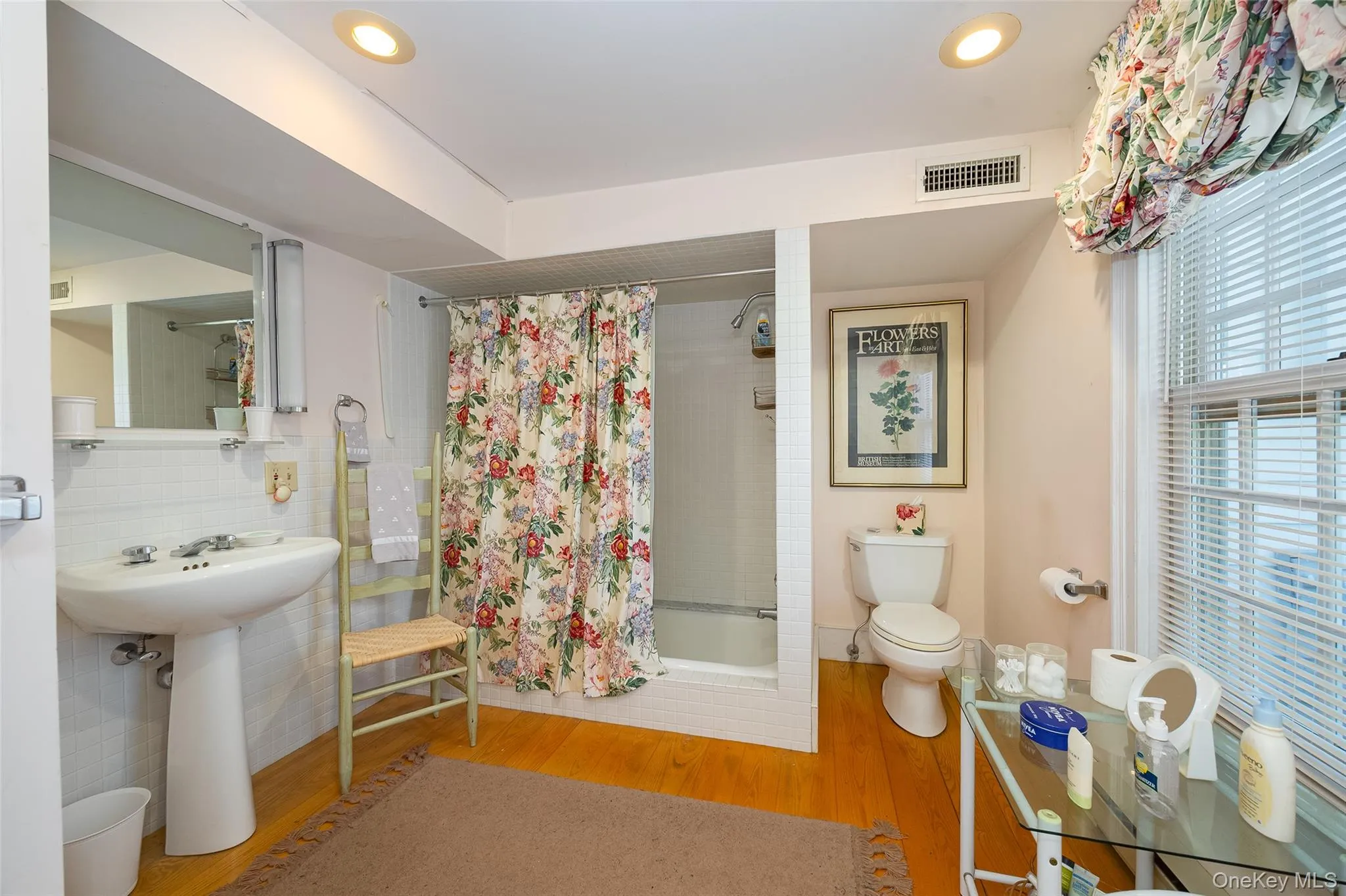 Lower-level full bath with large soaking tub and linen closet Lower-level full bath with large soaking tub and linen closet