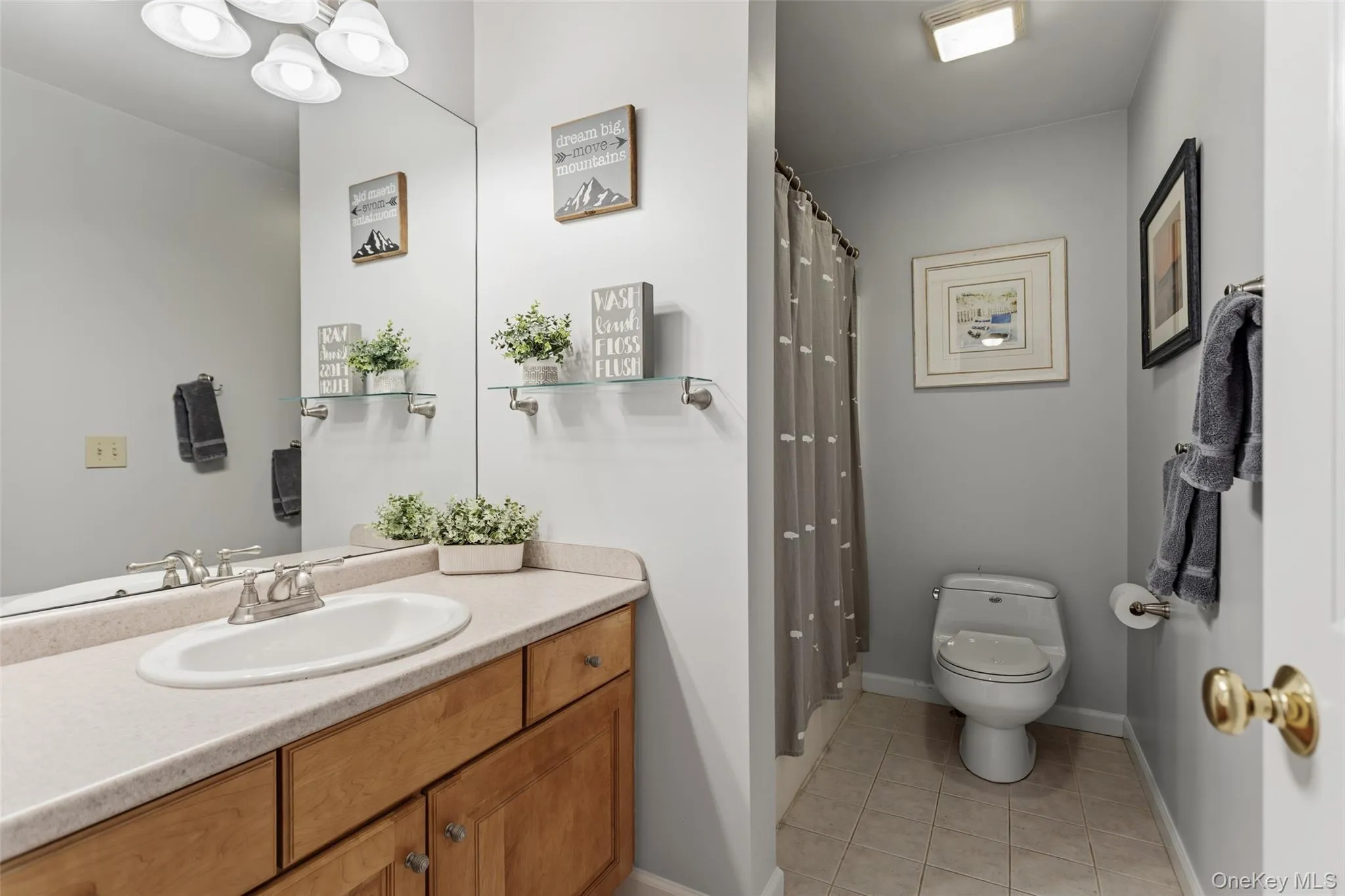 Full bath with linen closet Full bath with linen closet