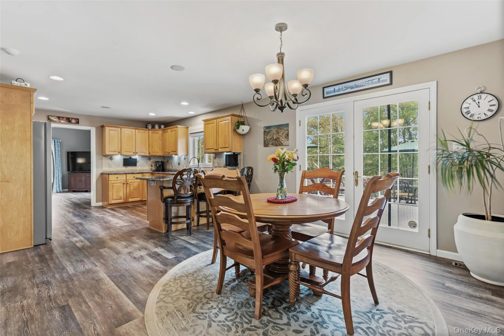 Eat-in kitchen with breakfast area and sliders to deck Eat-in kitchen with breakfast area and sliders to deck