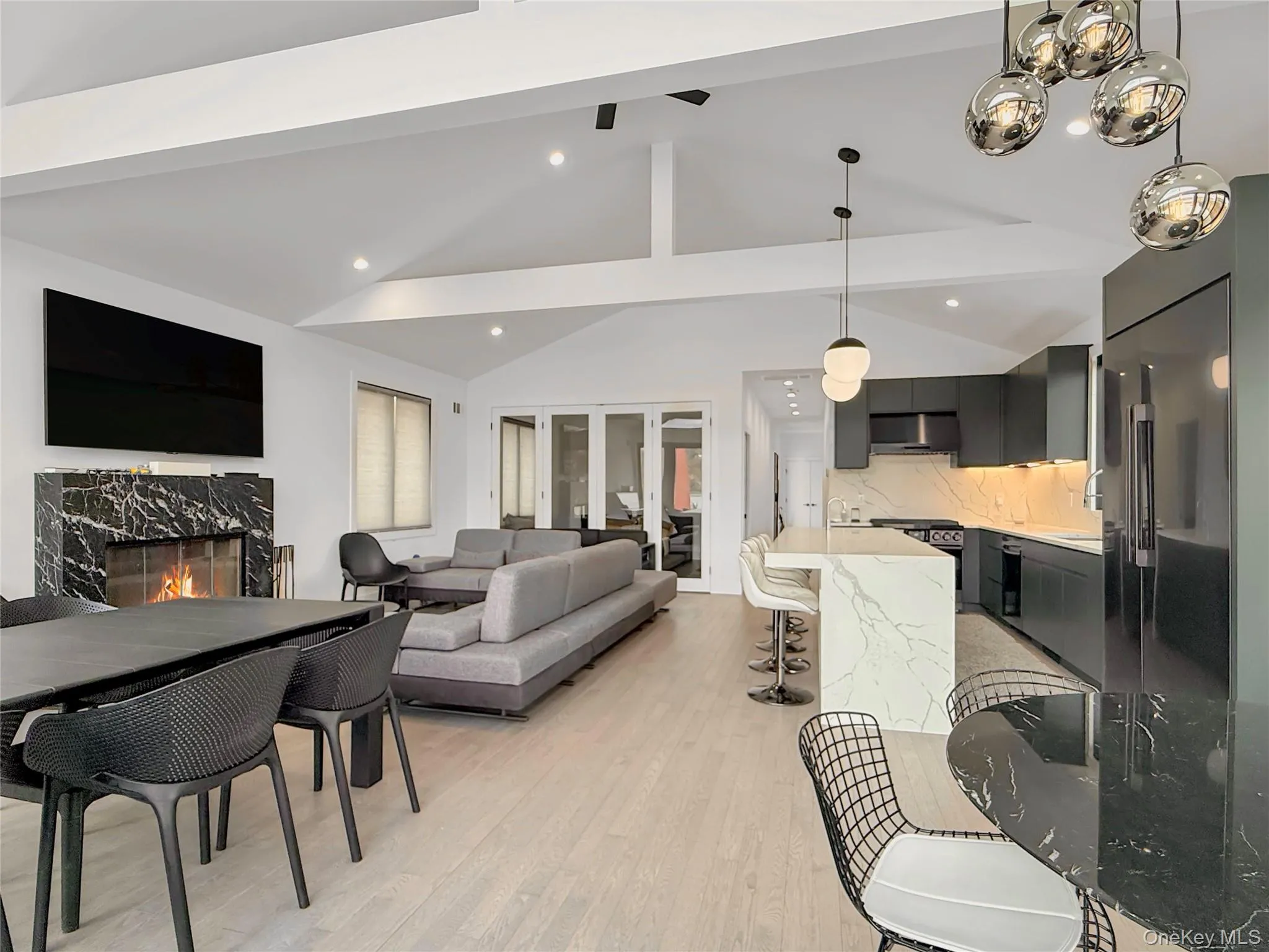 Living/dining area with gas fireplace Living/dining area with gas fireplace