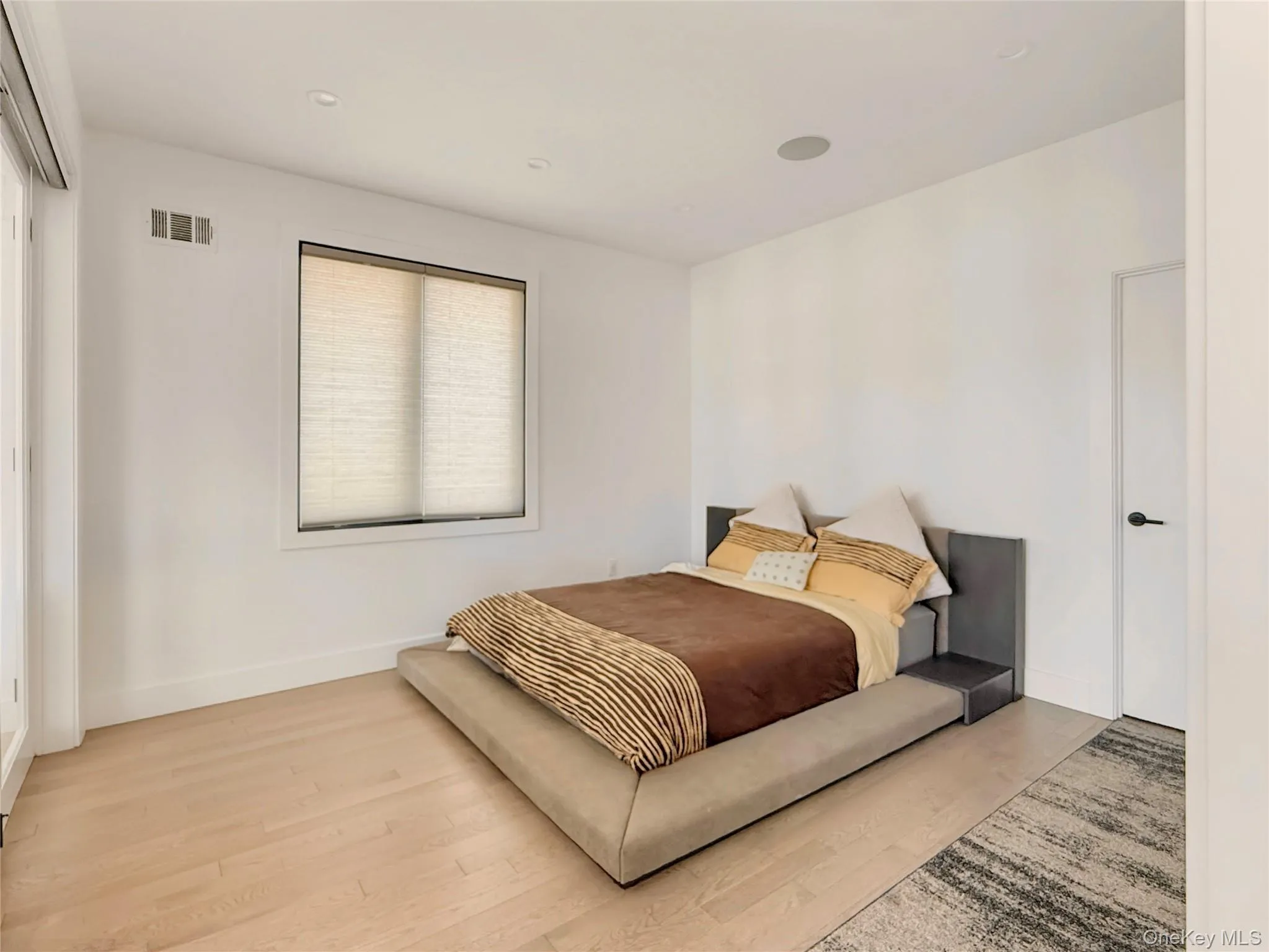 First floor bedroom space with sliding door access to living area First floor bedroom space with sliding door access to living area