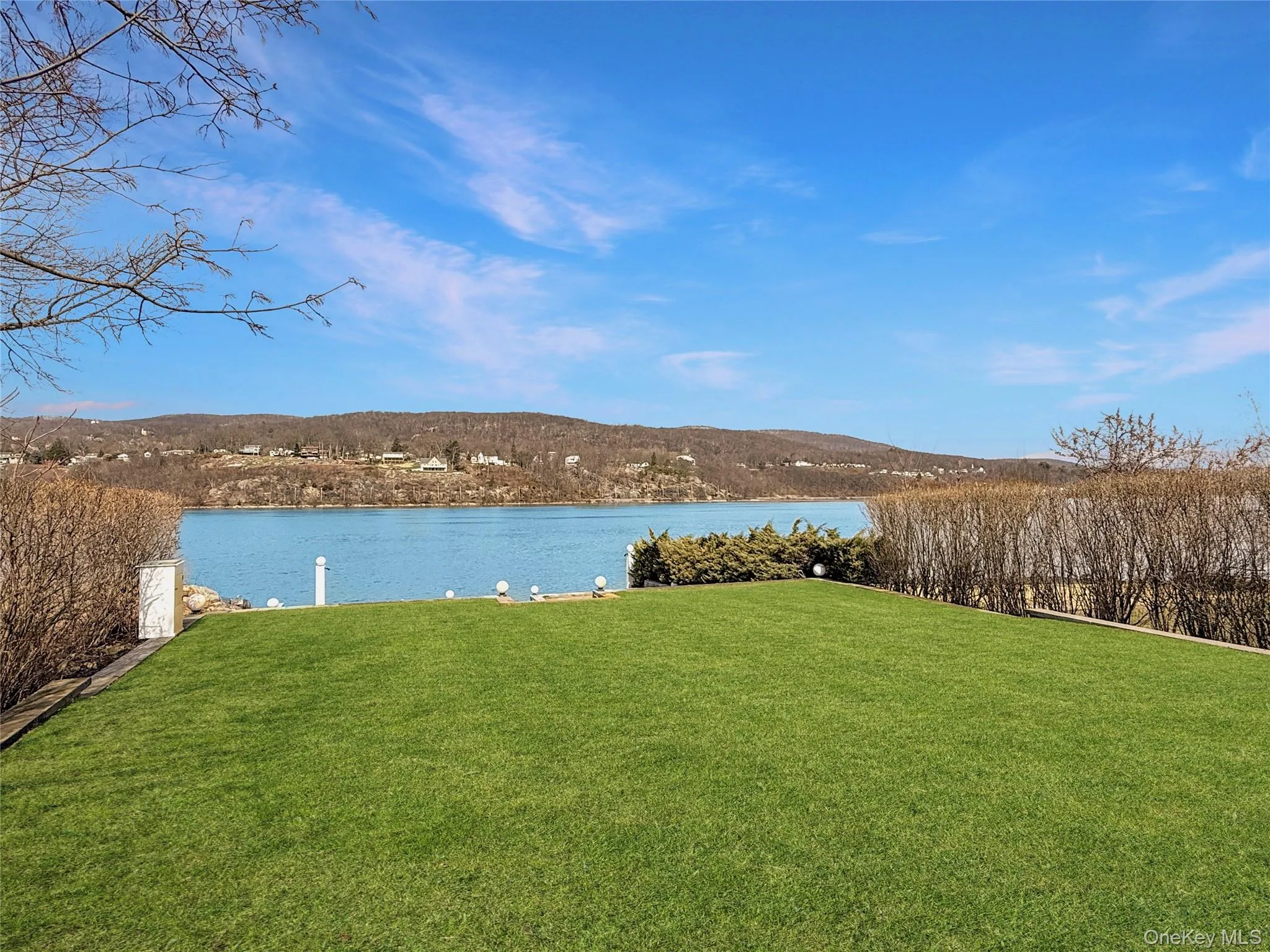Expansive yard and waterfront Hudson River access Expansive yard and waterfront Hudson River access