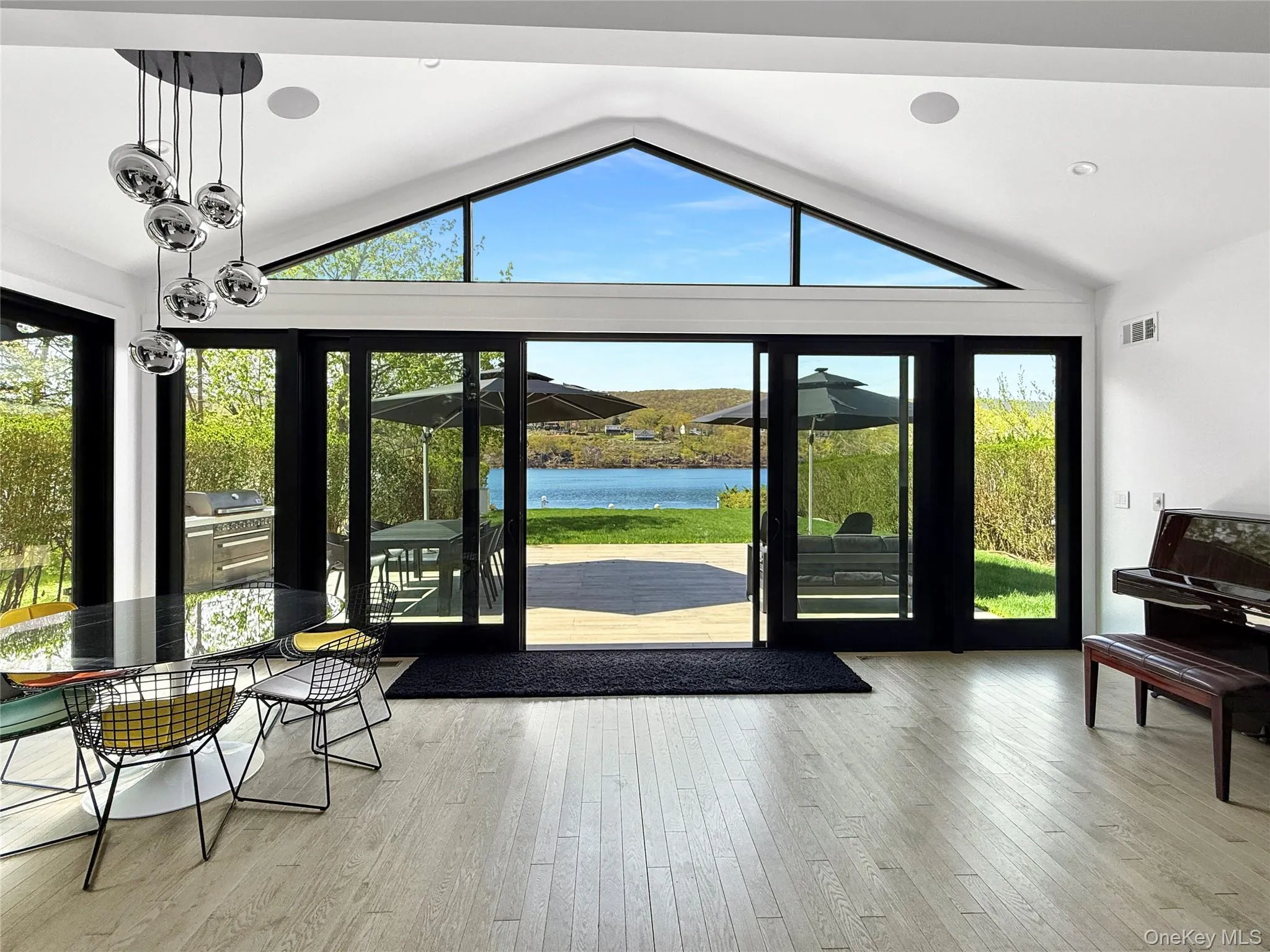 Sliding door access to deck, yard and Hudson River waterfront Sliding door access to deck, yard and Hudson River waterfront