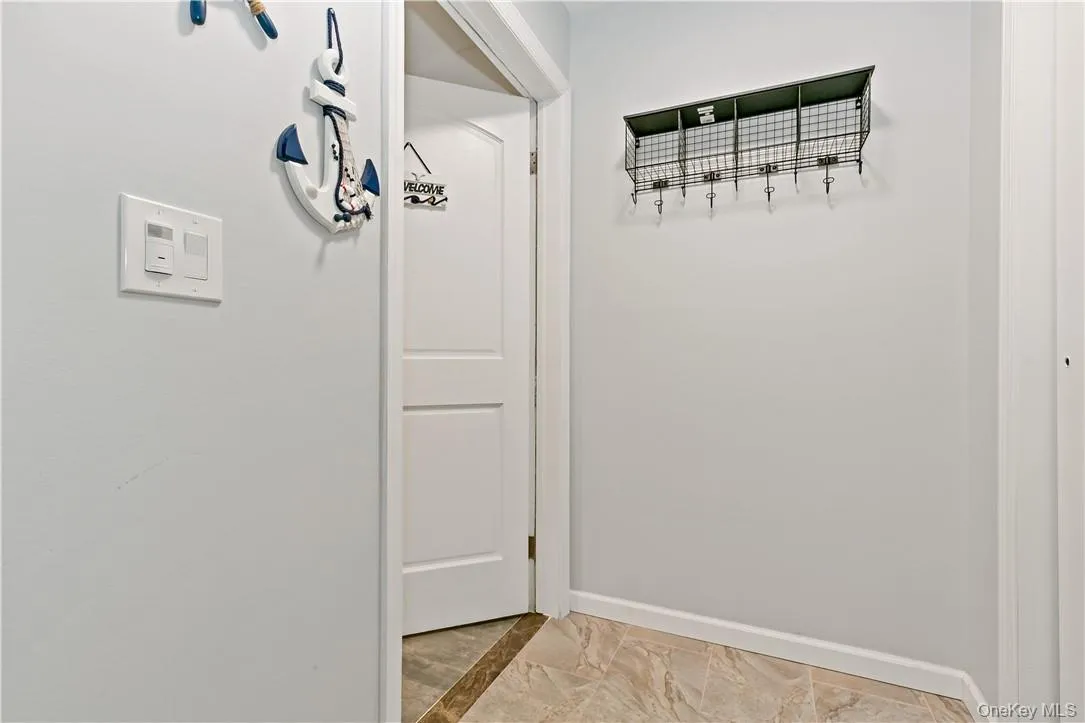 Entry Foyer with Coat Closet Entry Foyer with Coat Closet