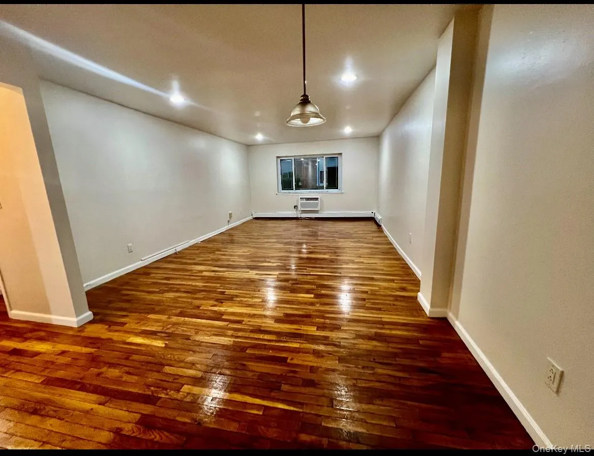 Attached open living room and dining room Attached open living room and dining room