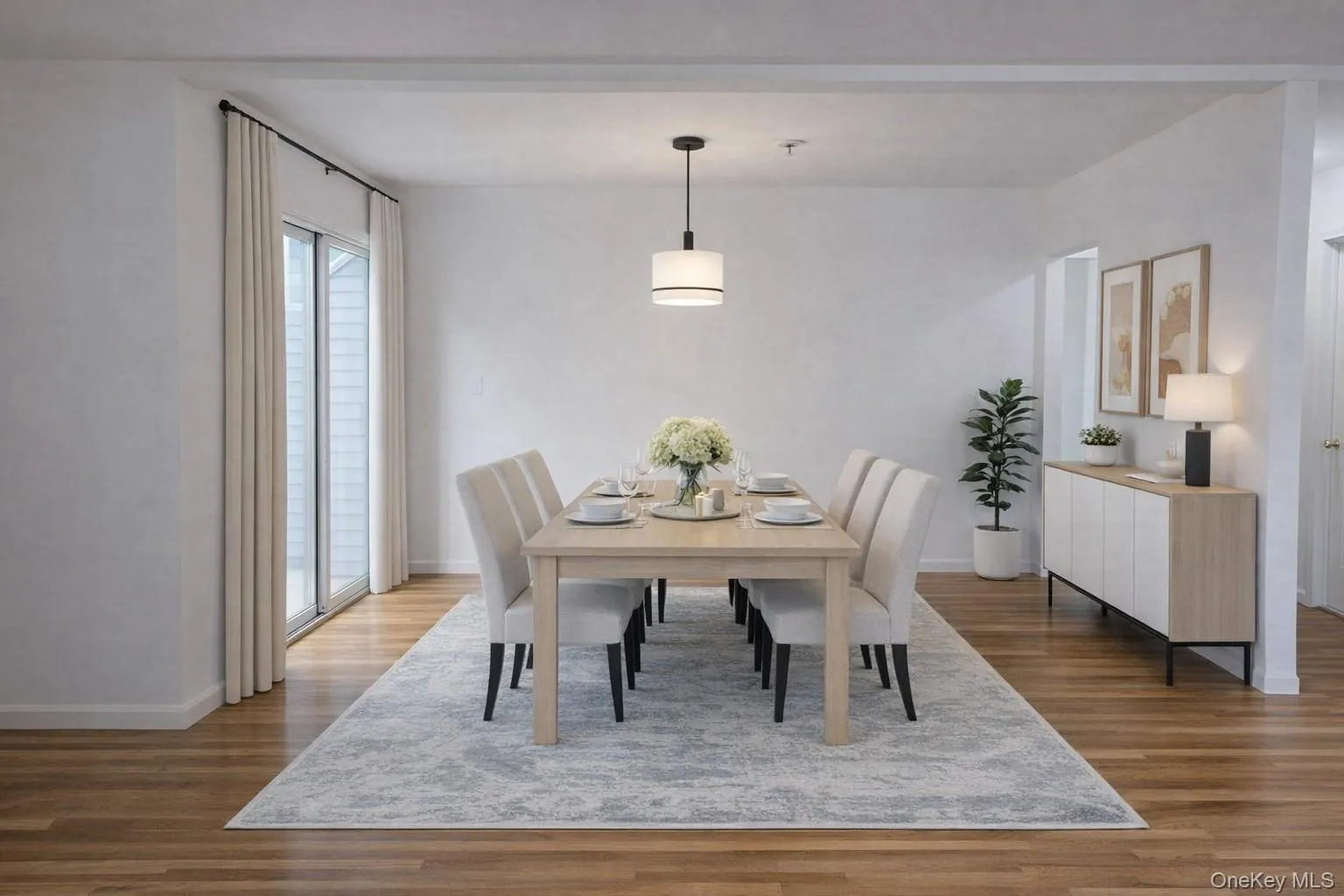 Light and bright dining room with glass sliding doors leading to private deck (Virtually staged) Light and bright dining room with glass sliding doors leading to private deck (Virtually staged)